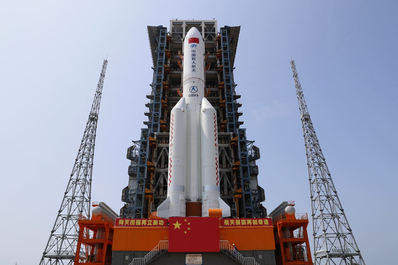 China says most rocket debris burned up during re-entry over the Indian ...