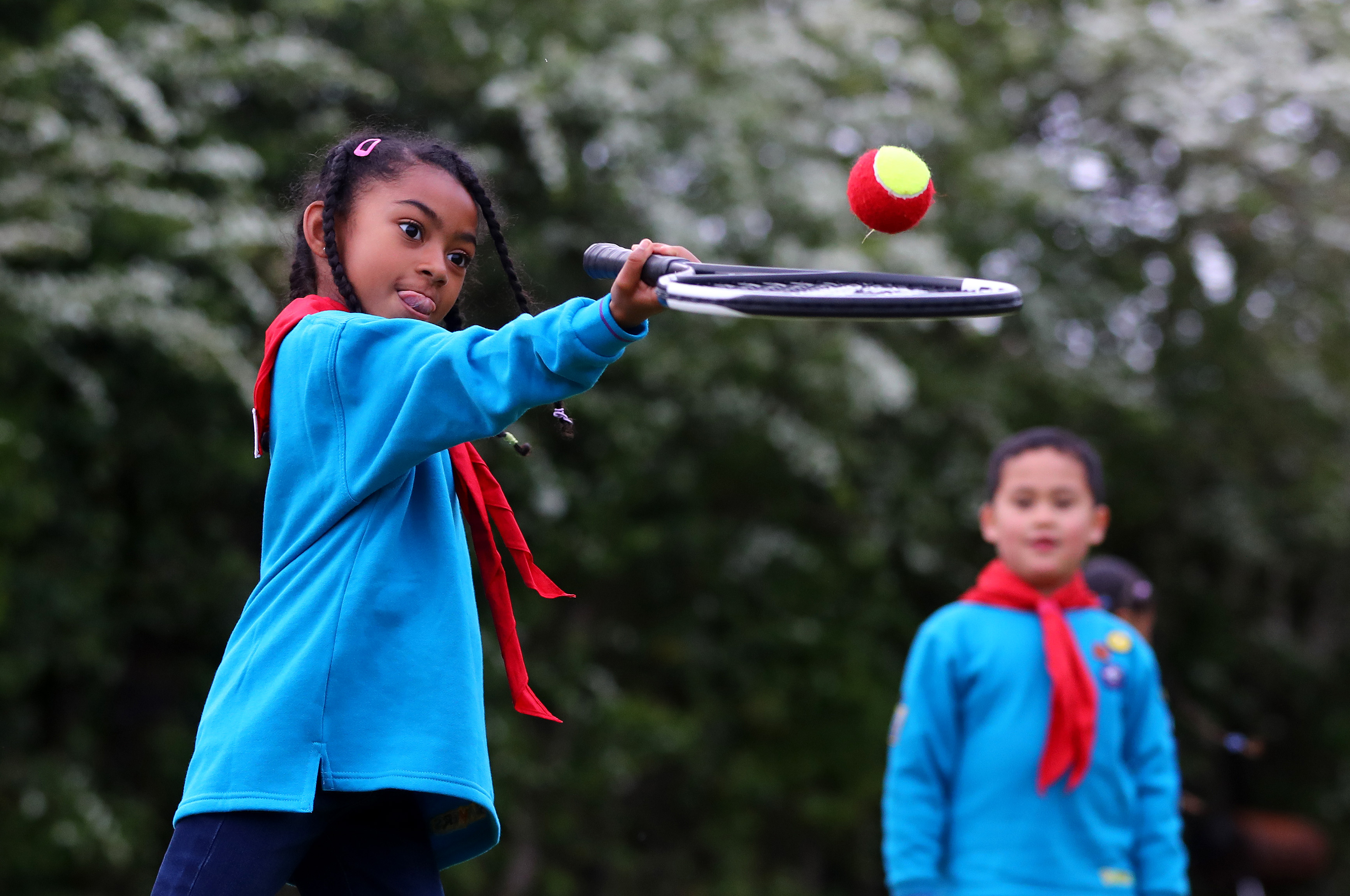 A young Beaver in Northolt tries out tennis