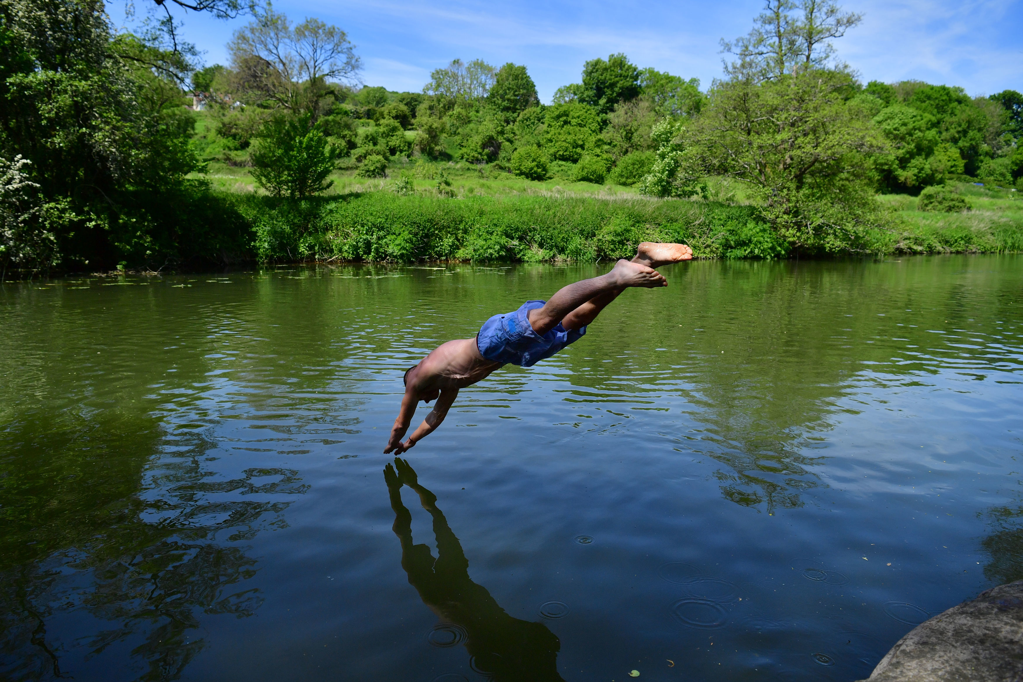 Swimmers enjoy the hot weather