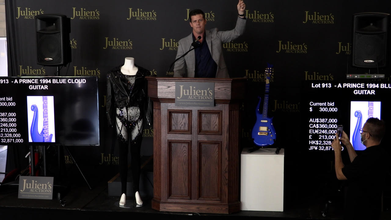 Jullien's Auctions of Prince blue cloud guitar auctioneer Zack Krone