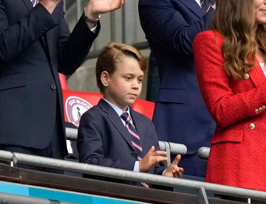 George applauding before the start of the match 