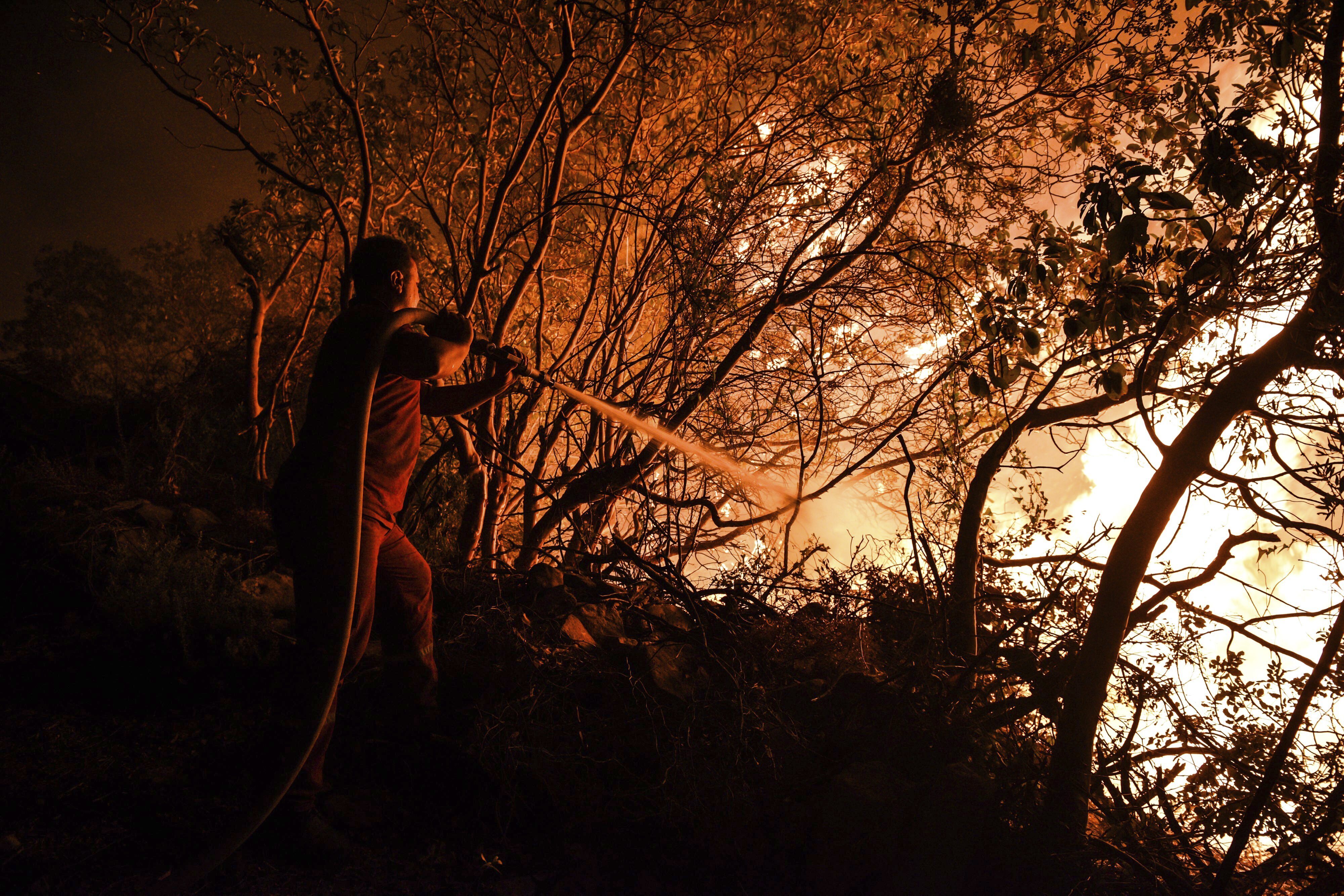 A firefighter in Kirli village in Antalya province 