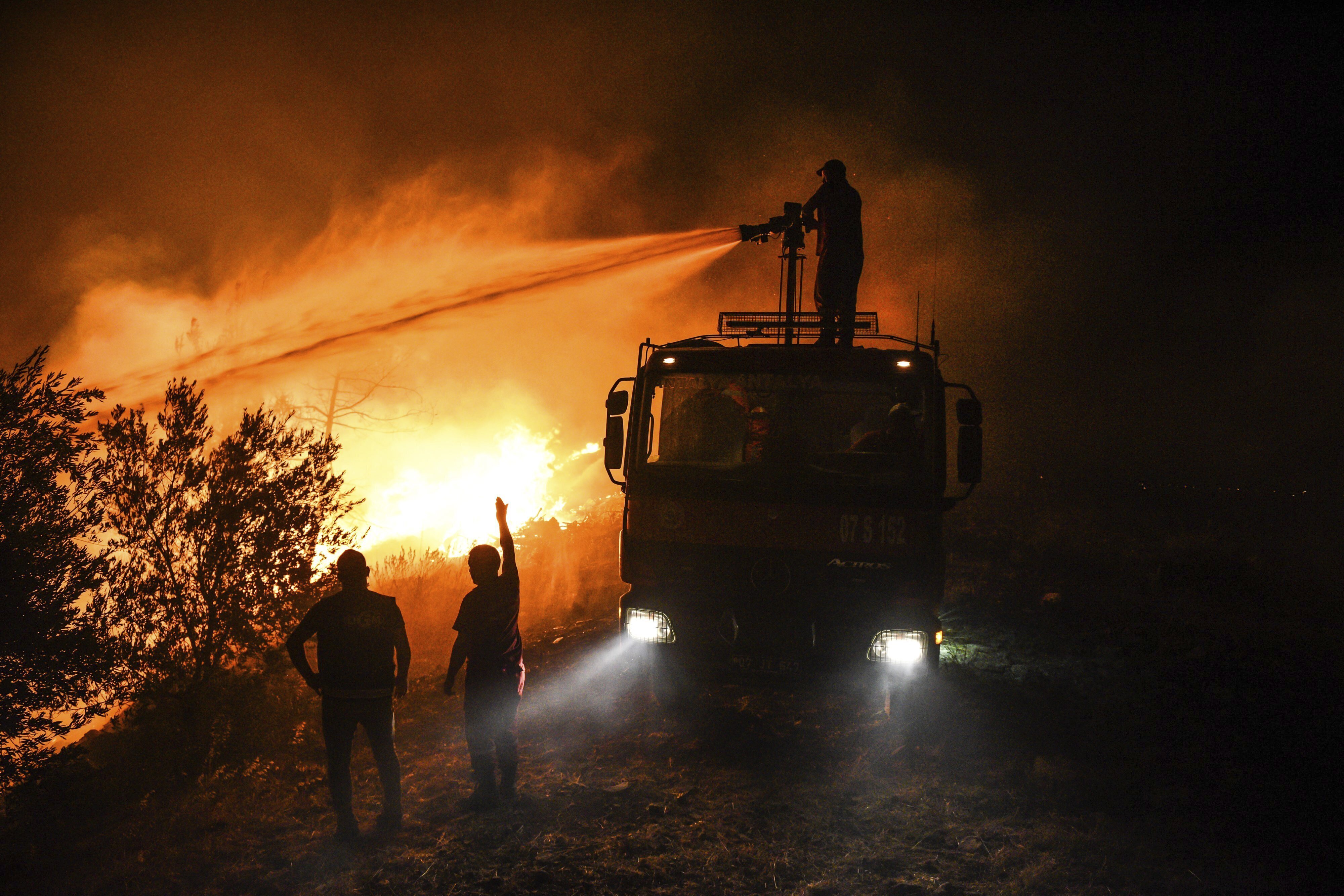 Firefighters in Kirli village in Antalya province 