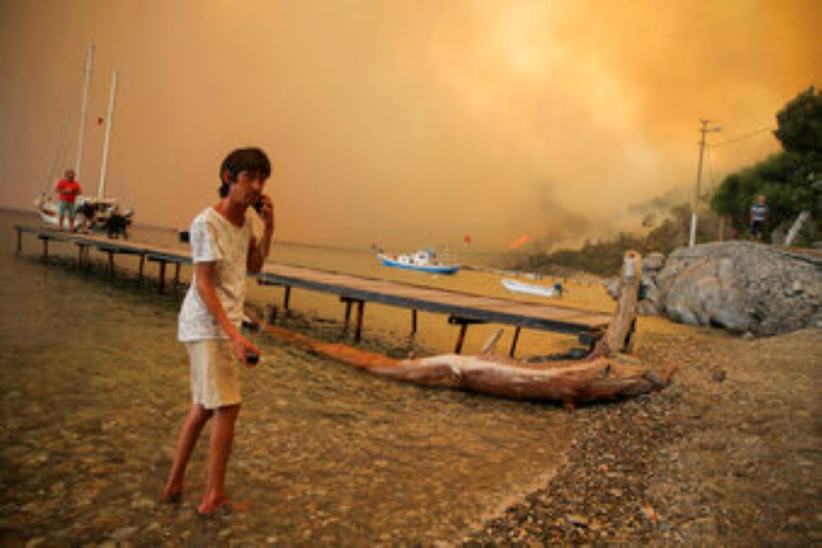 Turkey's beach resorts have been targeted in the fire (Emre Tazegul/AP)