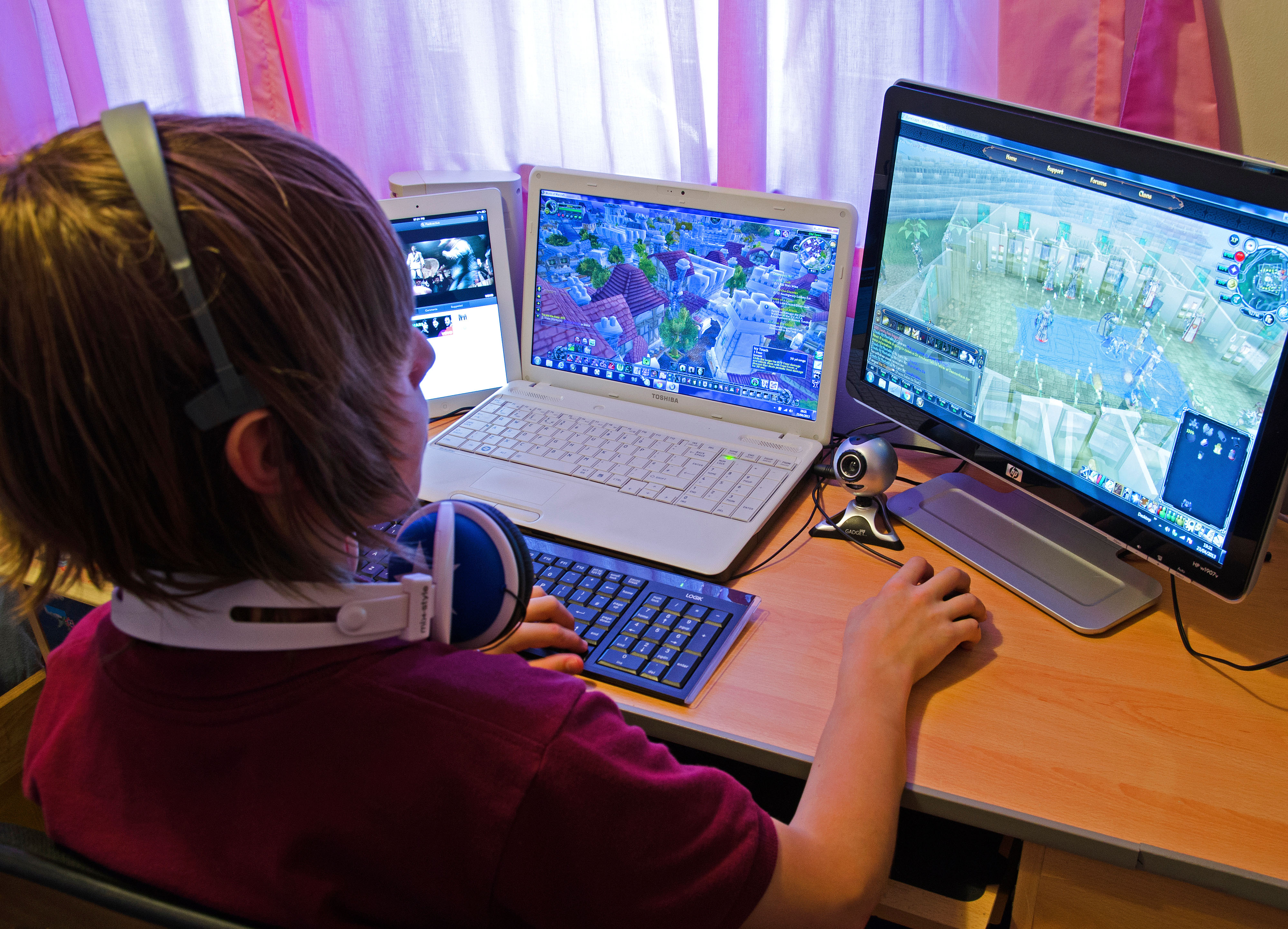 a child gaming on a pc