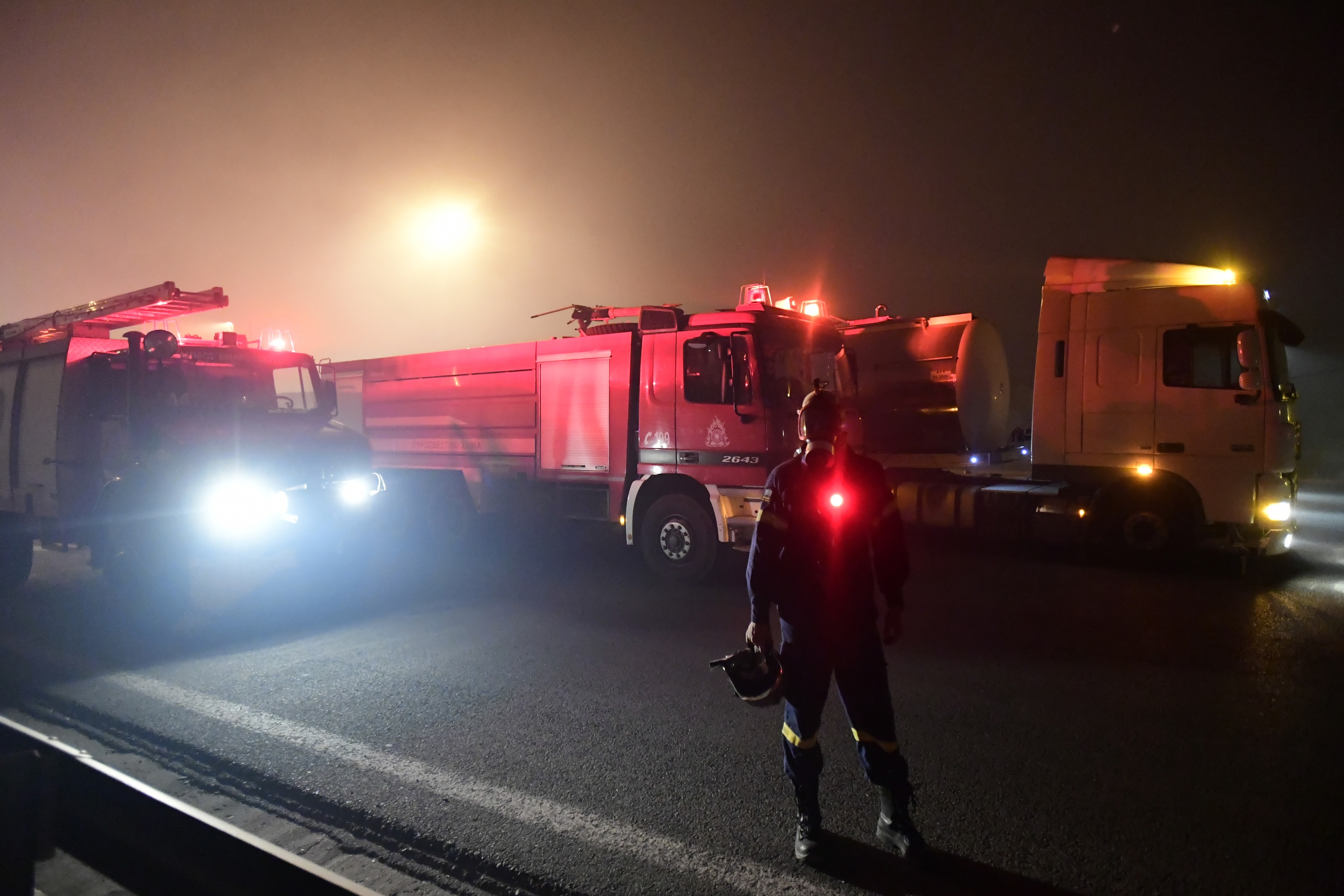 Fire vehicles operate during a wildfire in Afidnes area, northern Athens, Greece (Michael Varaklas/AP)