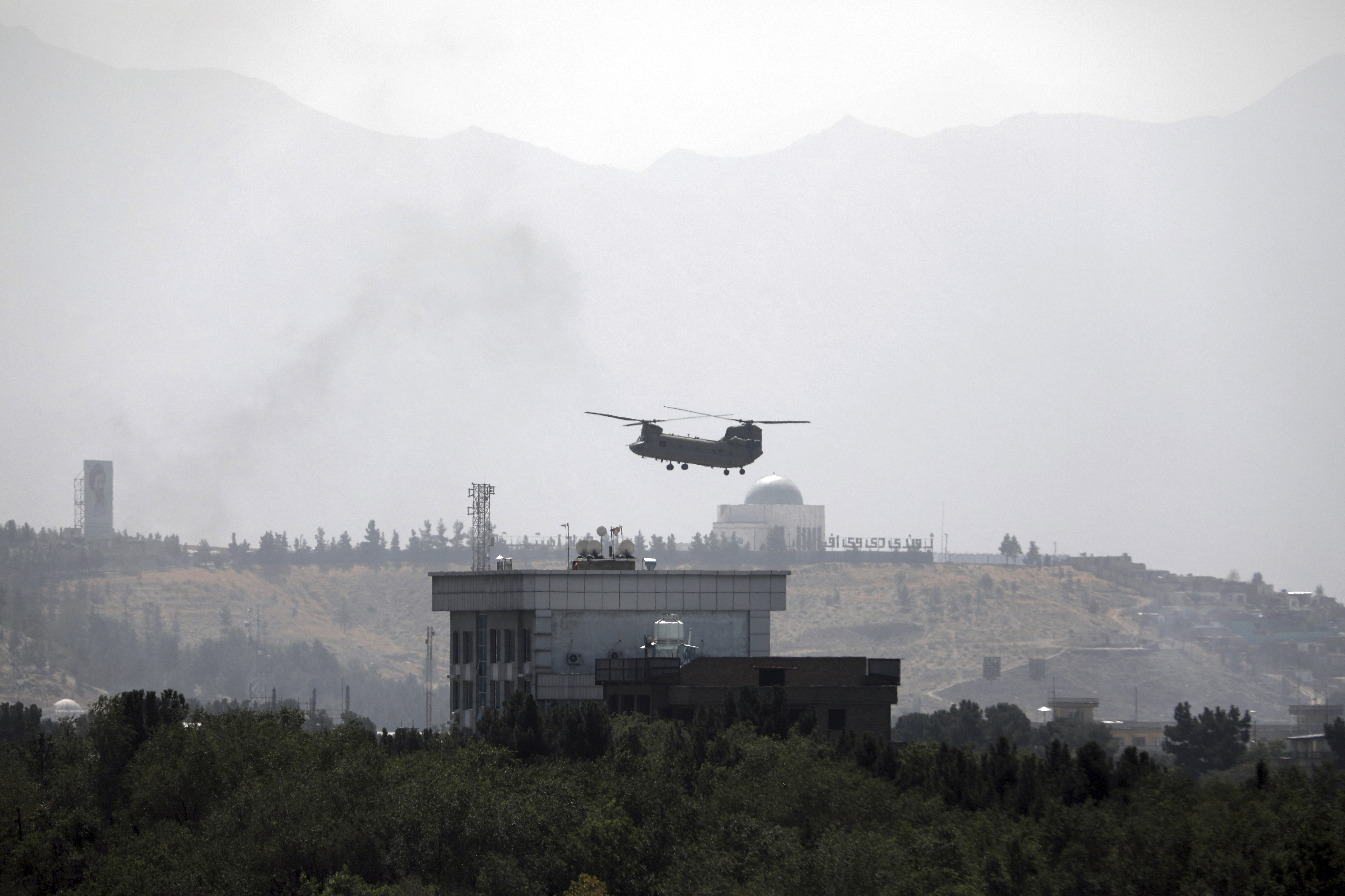 A US Chinook helicopter flies over the US embassy in Kabul, Afghanistan