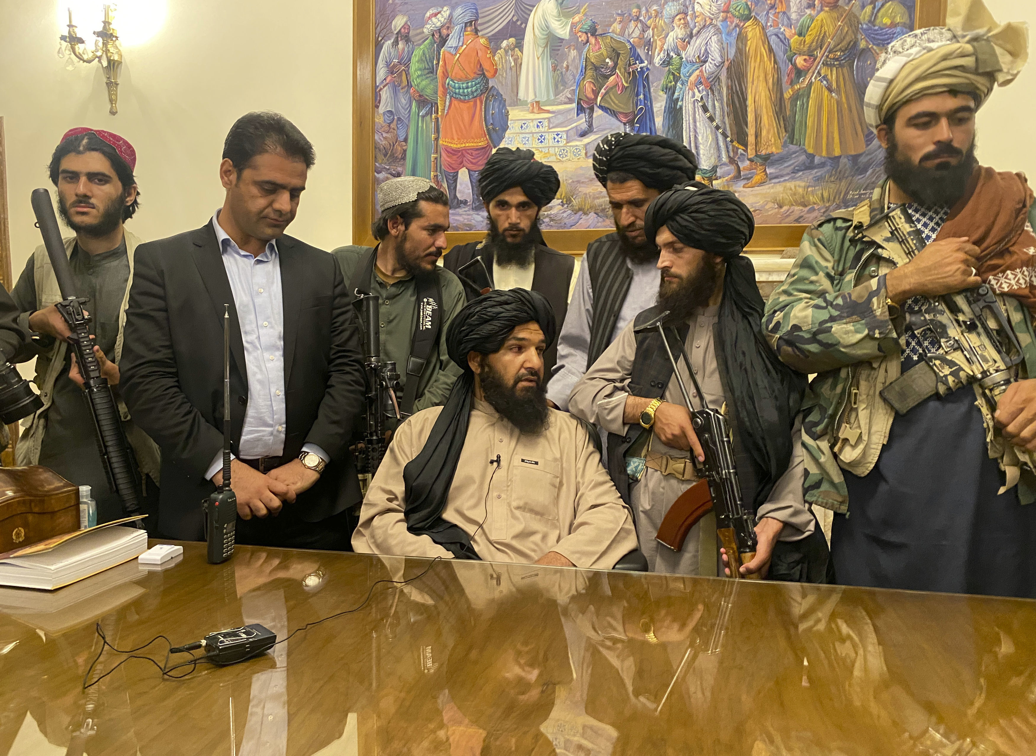 Taliban fighters take control of  the Afghan presidential palace (Zabi Karimi/AP)