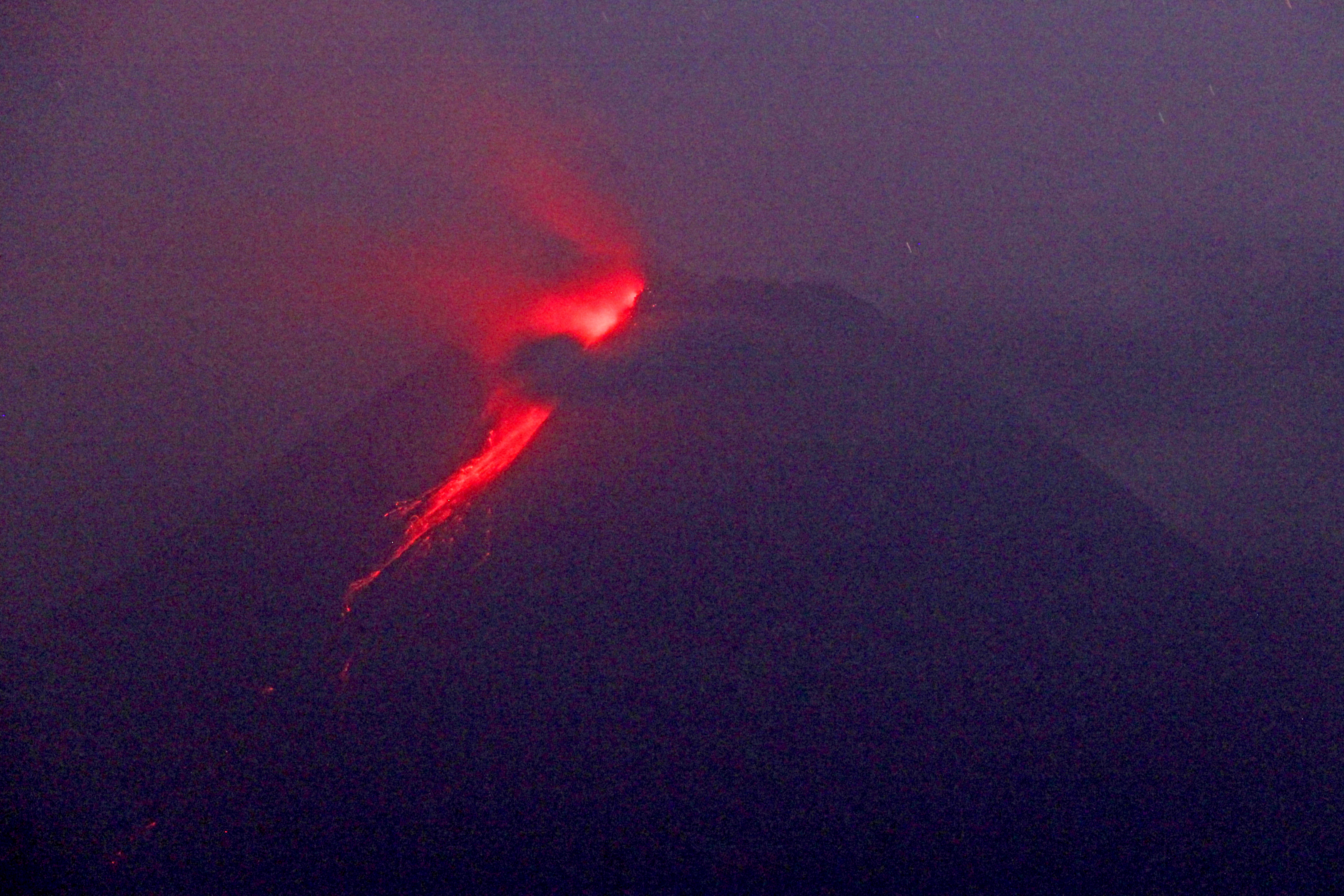 Hot lava runs down from the crater of Mount Merapi in Sleman, Yogyakarta, Indonesia