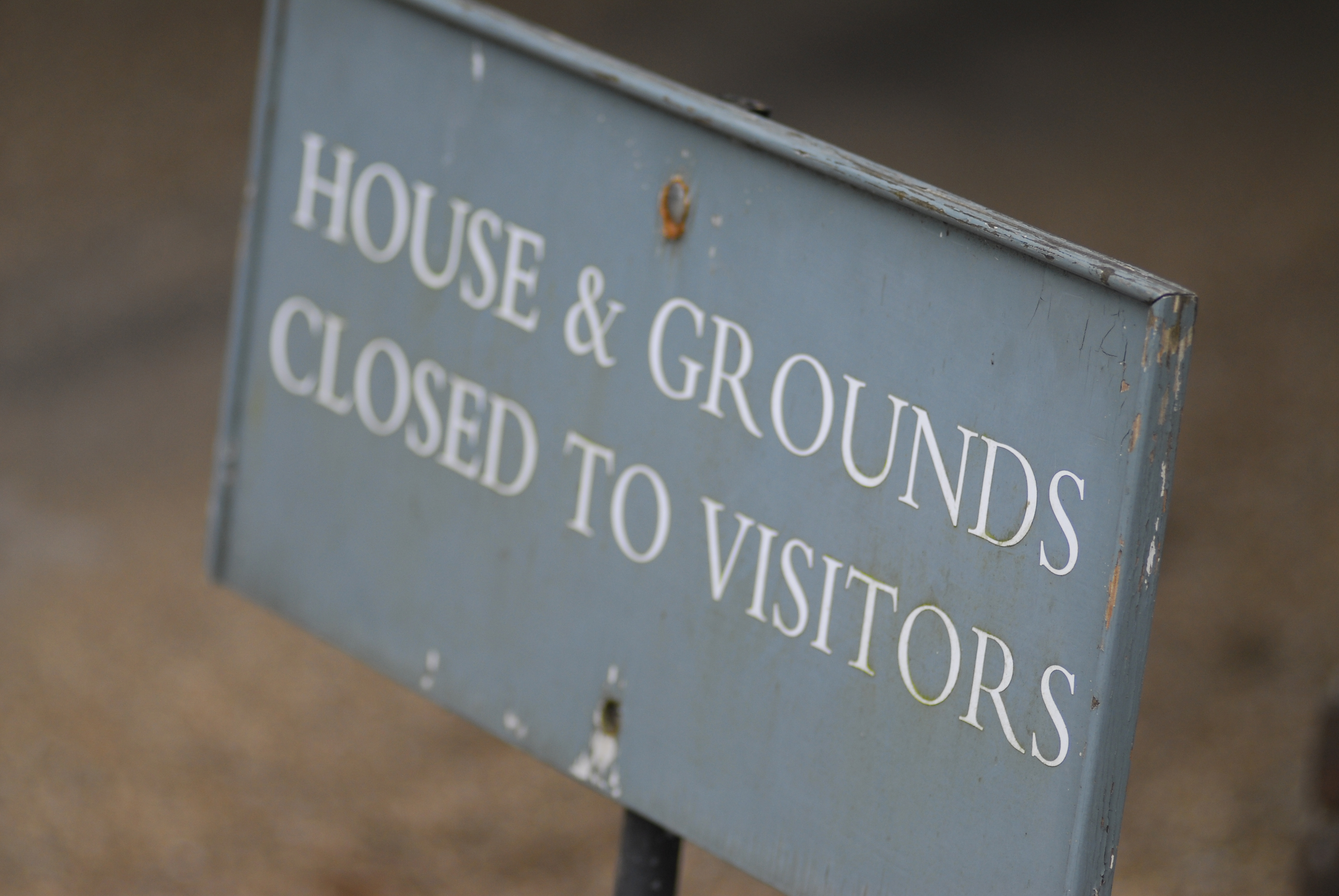 An old 'Closed to Visitors' sign at West Wycombe Park, Buckinghamshire