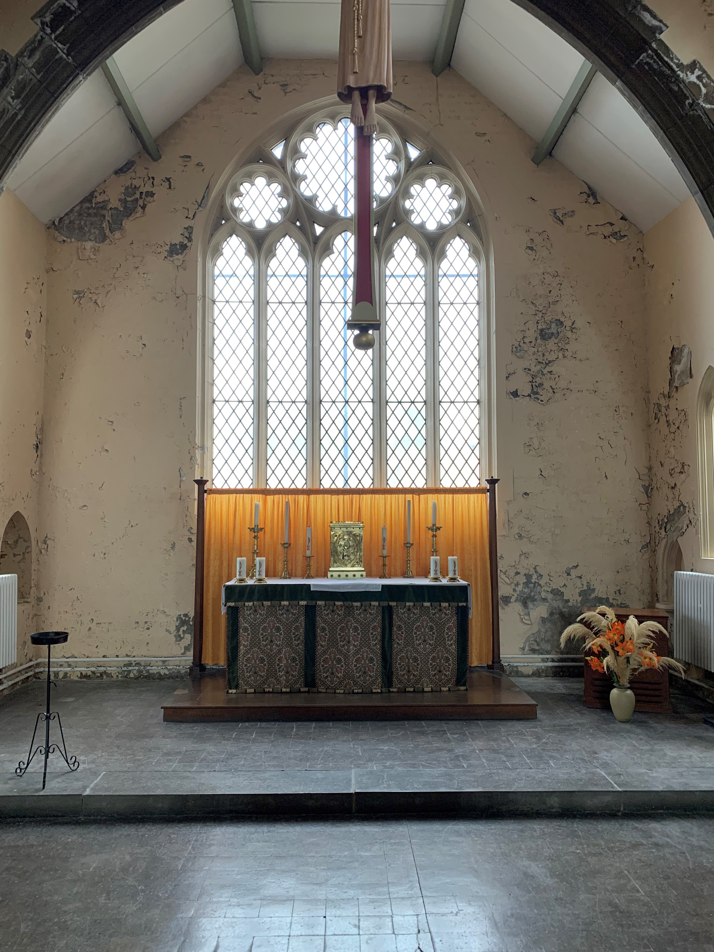 The damaged plaster at St Simon and St Jude Church