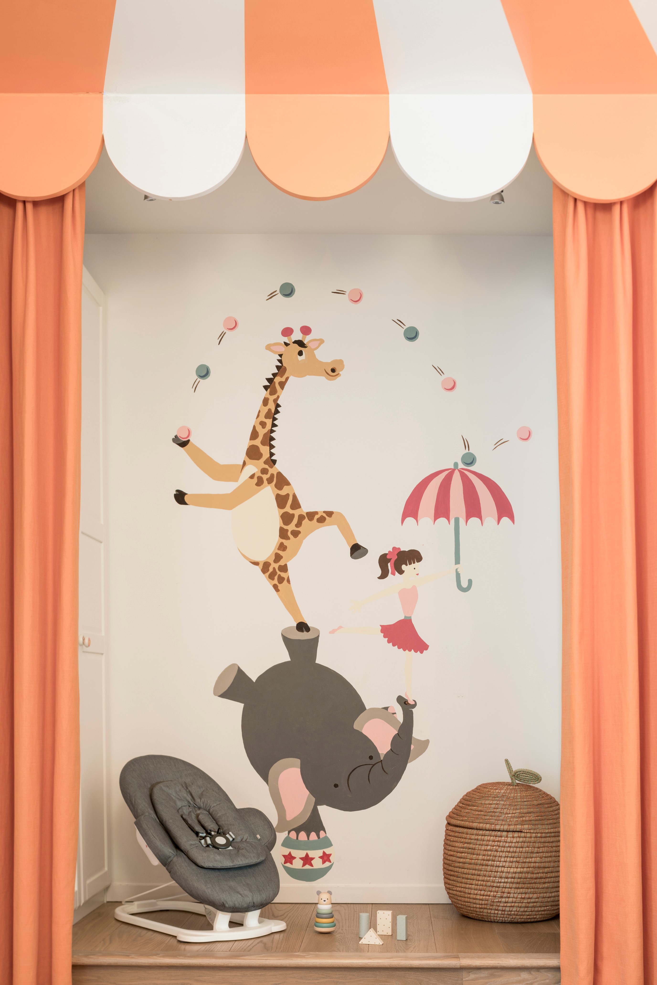 A chair in front of children's circus wallpaper (Tripp Trapp/PA)
