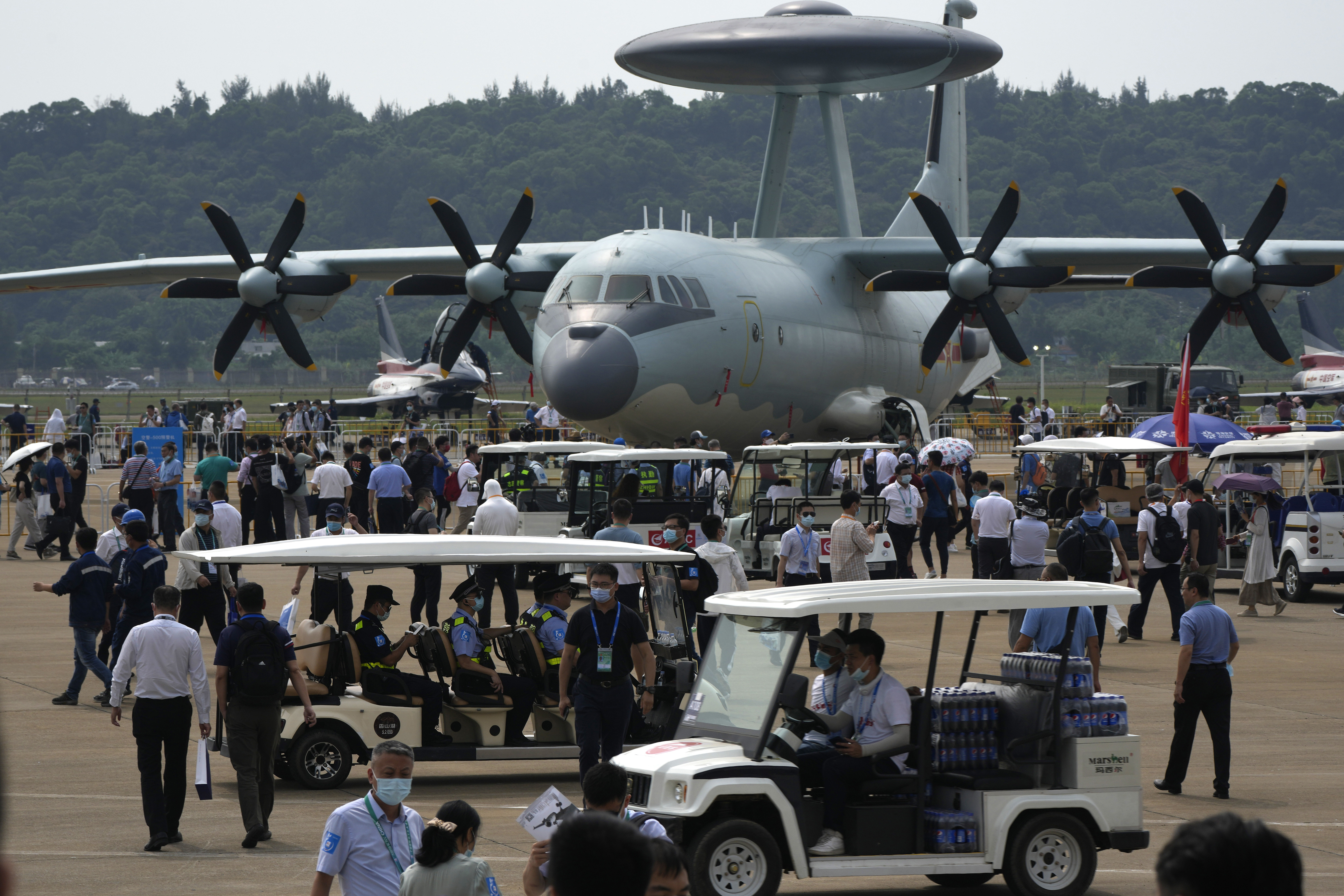 Visitors look at the Chinese military's KJ-500 airborne early warning and control aircraft during the 13th China International Aviation and Aerospace Exhibition last month 