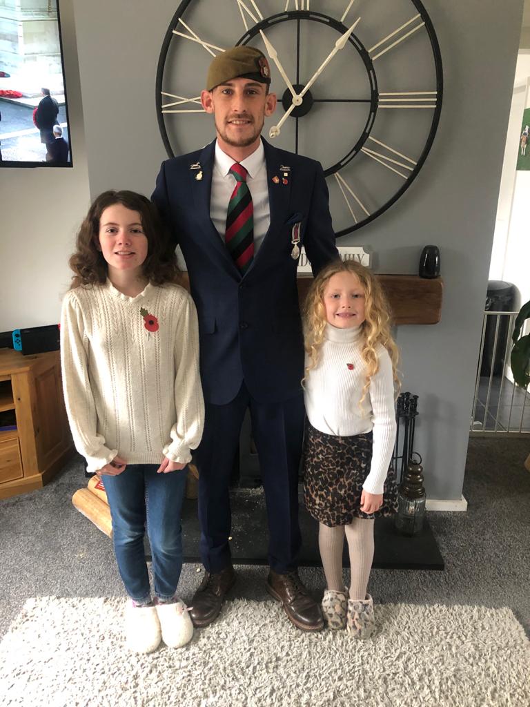 Former infantry soldier Ben Bainbridge and daughters Ellie, 11, and Ariel, seven (Help for Heroes/PA)