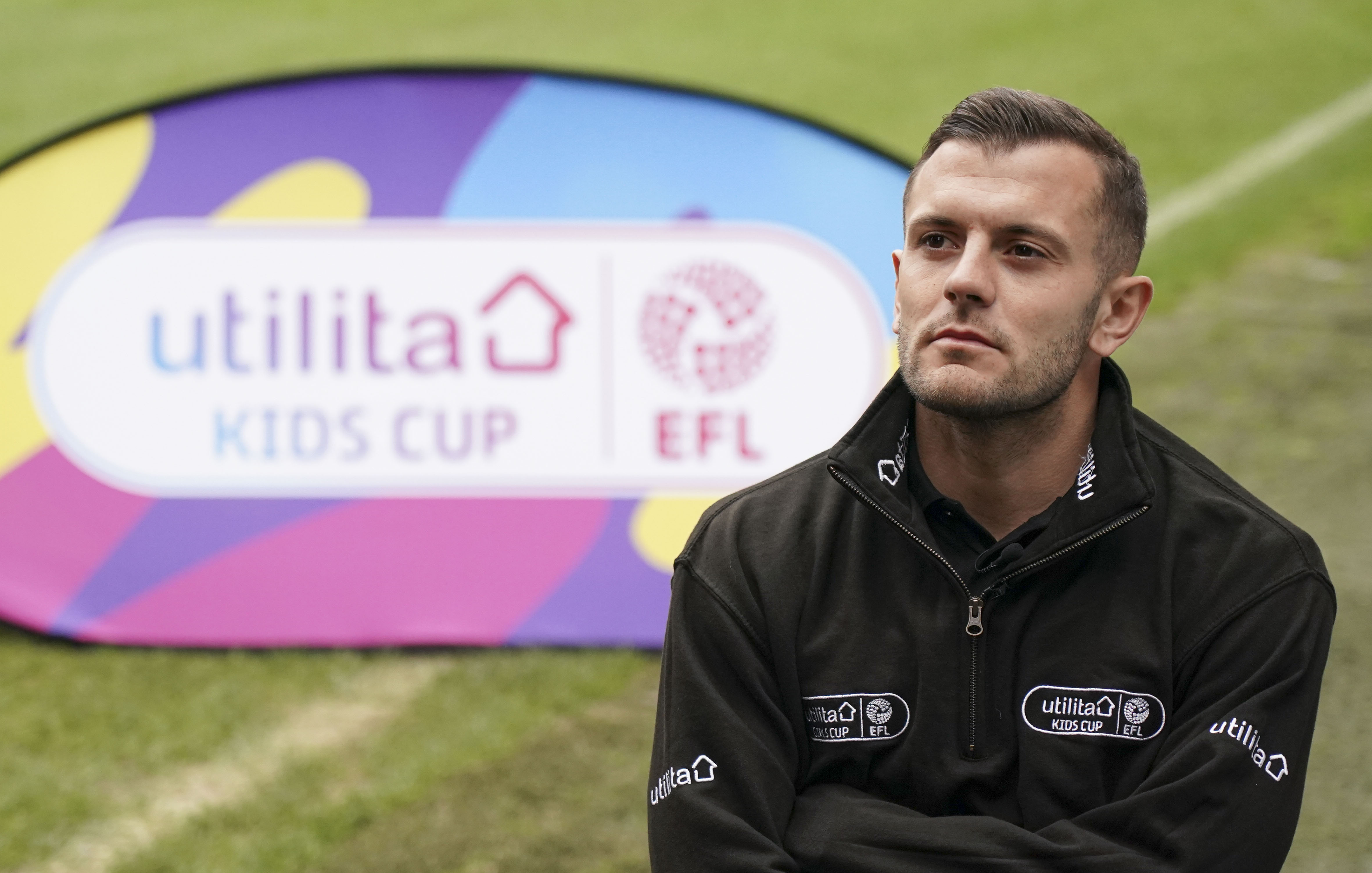 On the pitch at The Valley, home of Charlton Athletic, former Arsenal FC player Jack Wilshere, and former Birmingham, Chelsea and England player Karen Carney help to launch the Utilita Kids and Girls Cup with the children from Ealdham Primary School. 