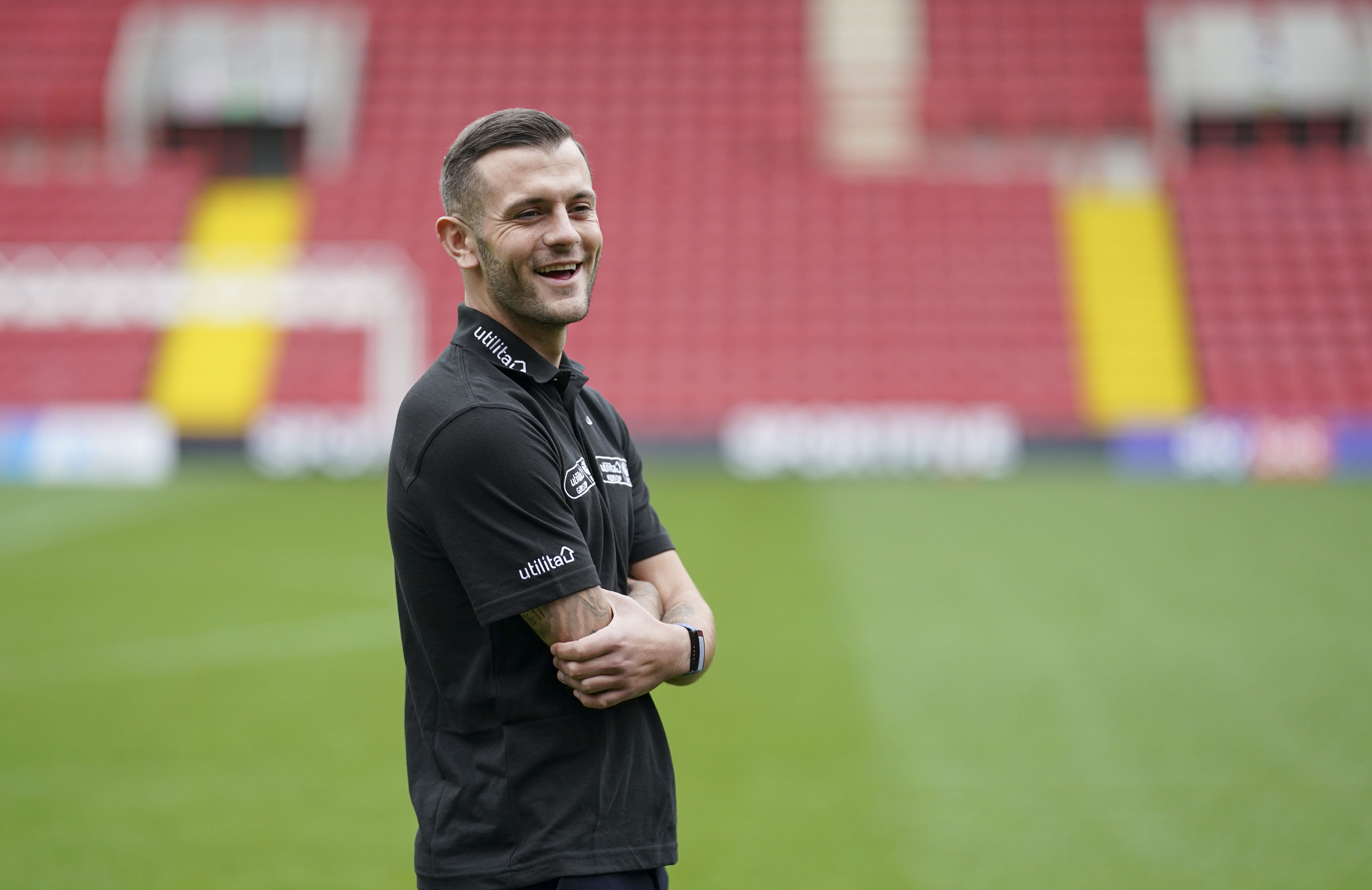 On the pitch at The Valley, home of Charlton Athletic, former Arsenal FC player Jack Wilshere, and former Birmingham, Chelsea and England player Karen Carney help to launch the Utilita Kids and Girls Cup with the children from Ealdham Primary School. 