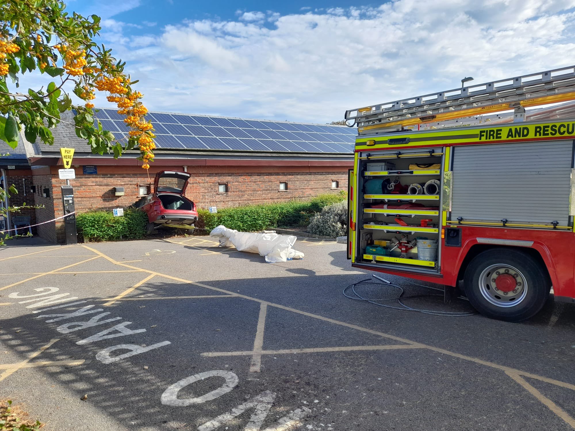 A car smashes through the wall of Hythe Library