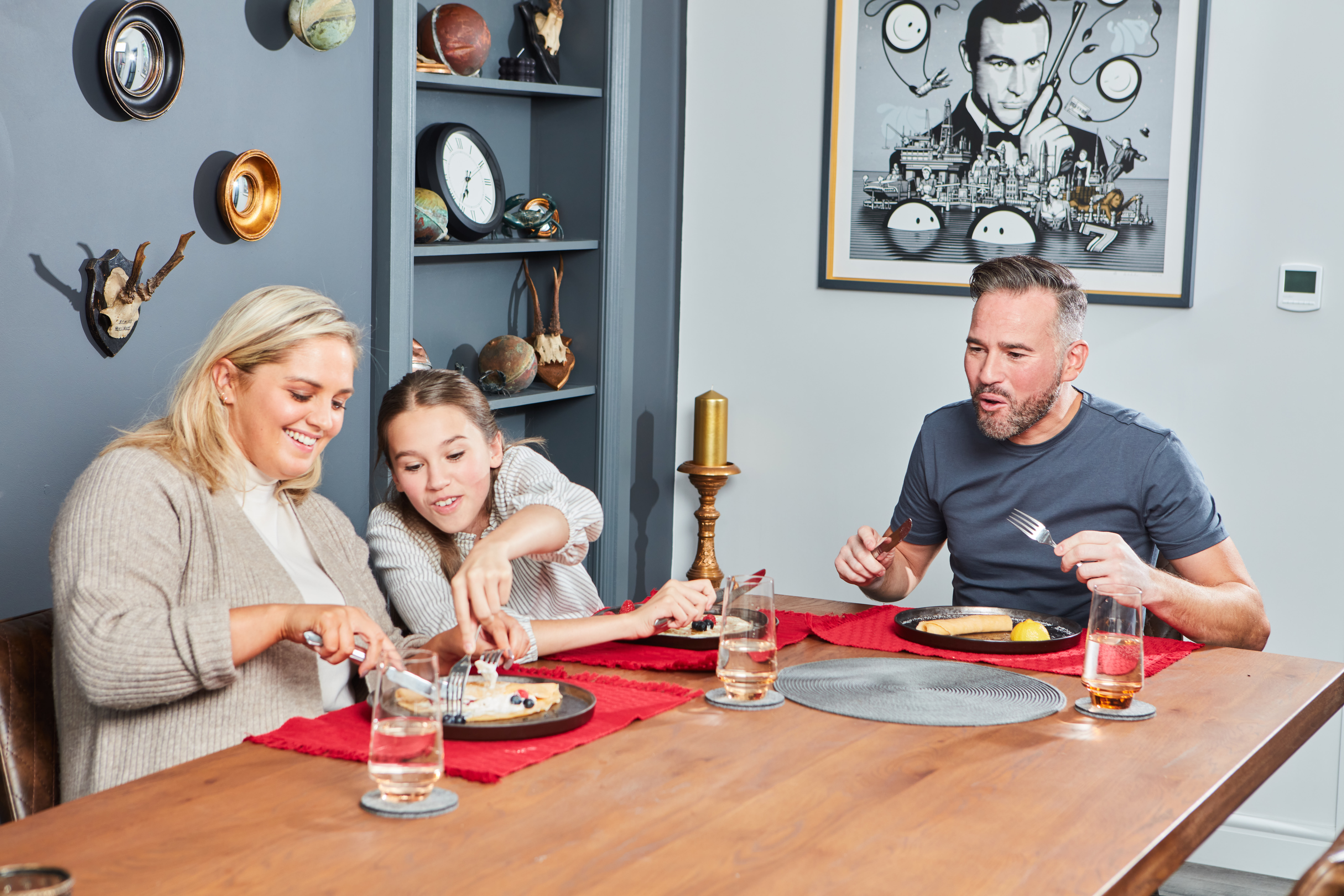 Dean Edwards, his fiance Liz & daughter Indie eating pancakes at the dinner table (Vodafone/PA)