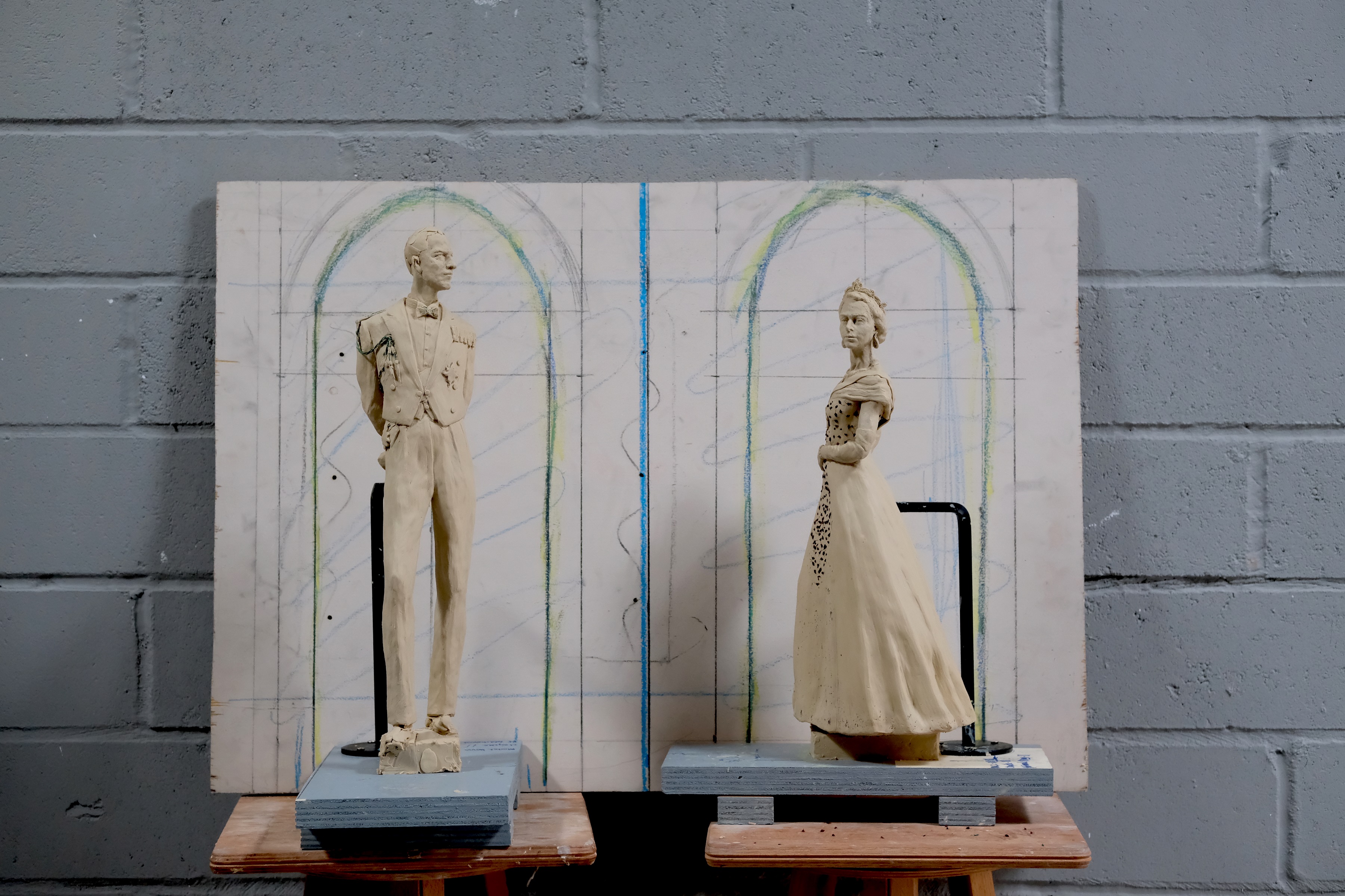 Models of Philip and the Queen made as part of the design process