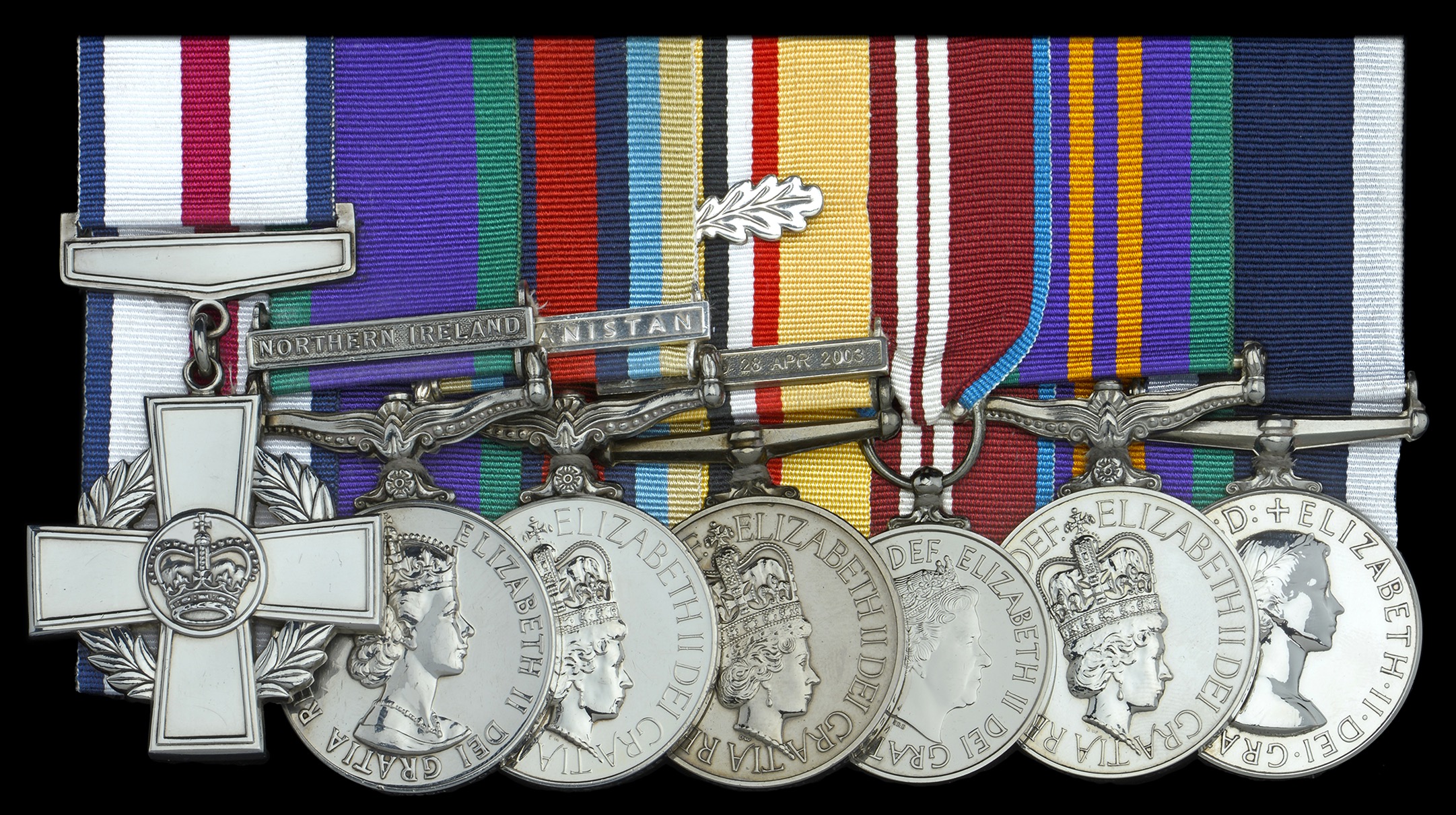 The medals belonging to Sgt Major John Thompson (left to right) the Conspicuous Gallantry Cross awarded in 2007; General Service medal, 1962-2007 - for service in Northern Ireland; Operational Service Medal 2000 - for service in Afghanistan; Iraq medal 2003-11; Queen Elizabeth II Diamond Jubilee Medal; Accumulated Campaign Service Medal 2011; Royal Navy Long Service and Good Conduct Medal.