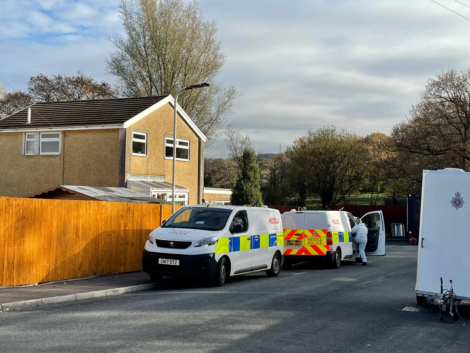 Forensic officers remain at the scene of suspected murder in Llantwit Fardre, Pontypridd. (Bronwen Weatherby/PA)