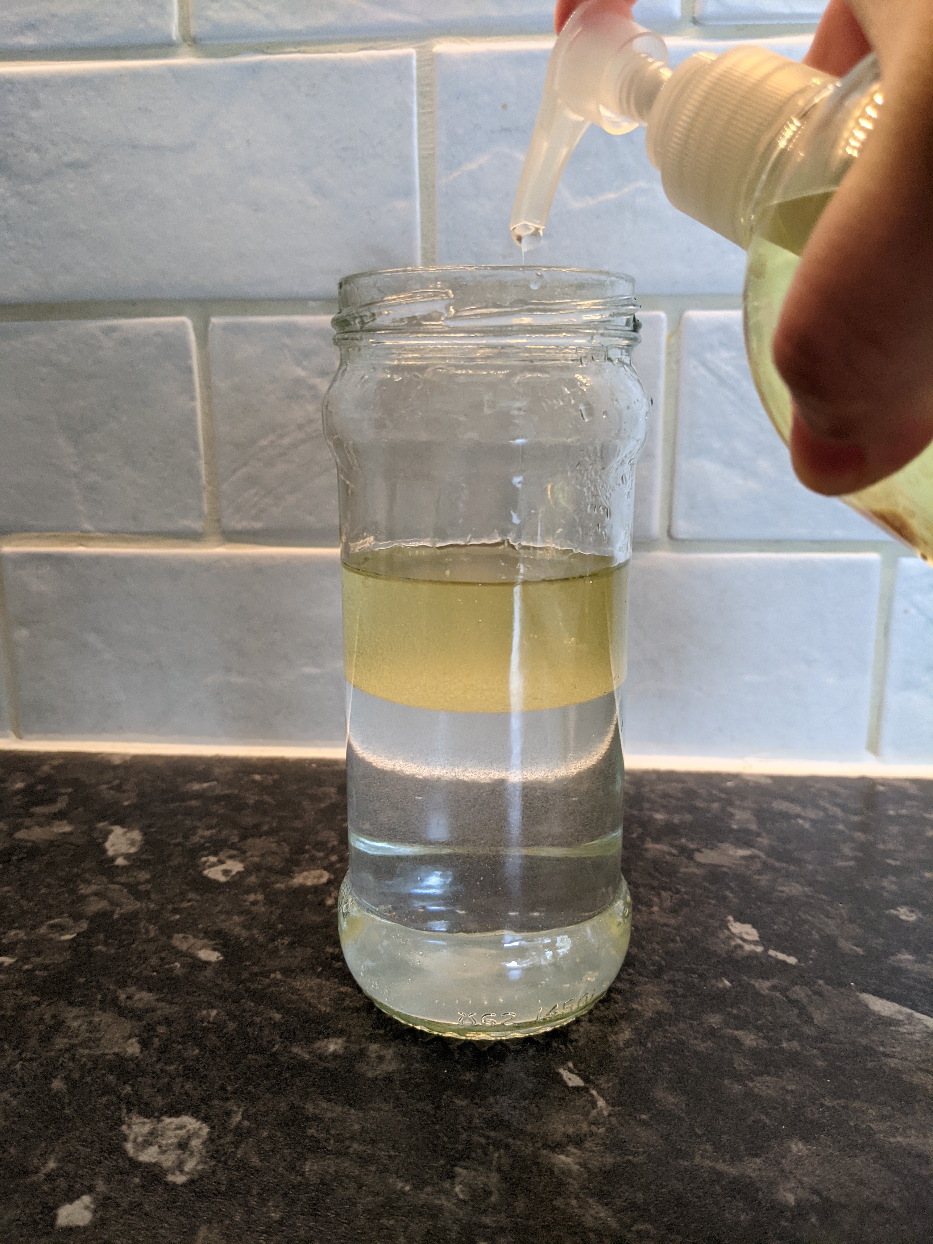 A jar containing separated water & oil (RI/PA)