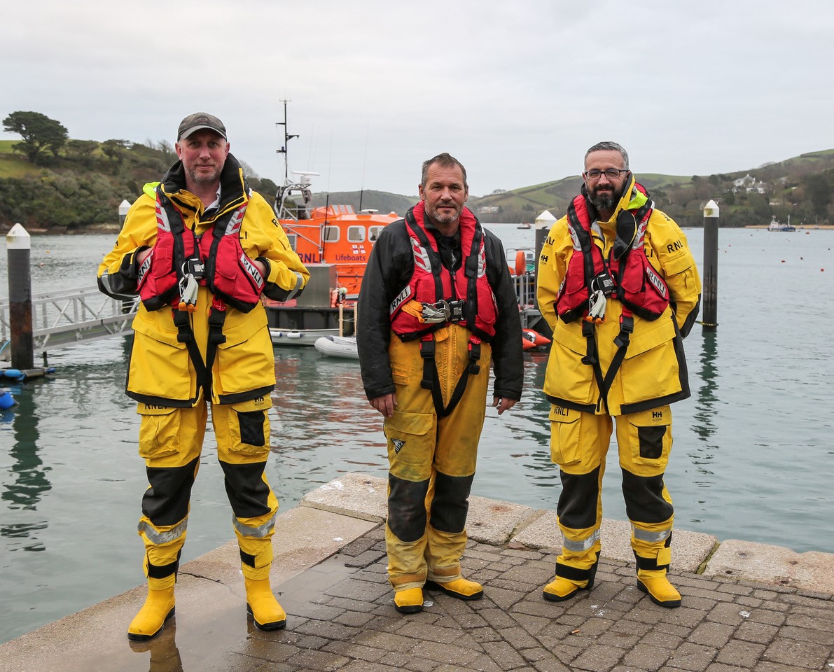 RNLI crew members Richard Clayton (L) and Iain Dundas (R) and Coxswain Chris Winzar (centre)
