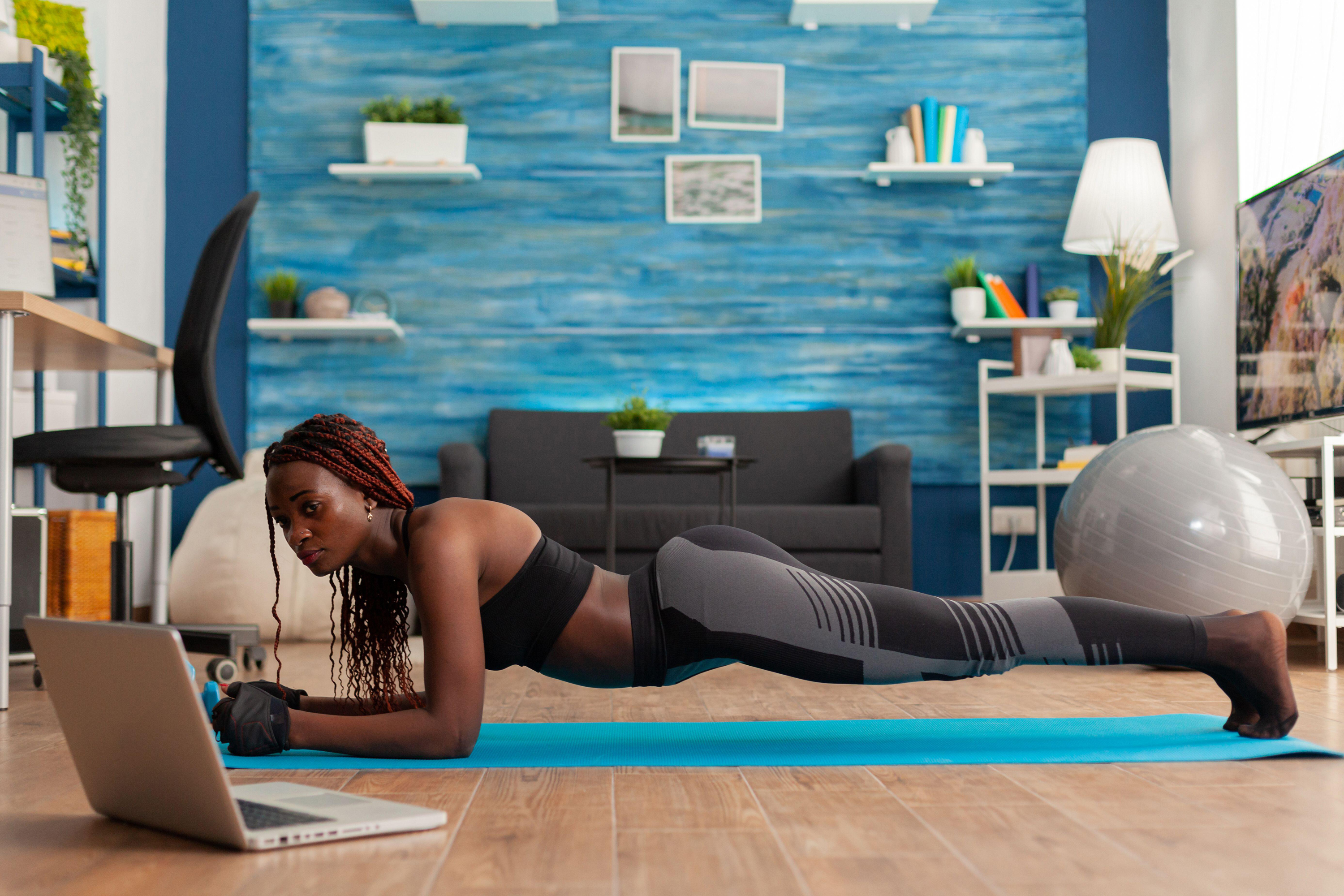 Woman Planking At Home