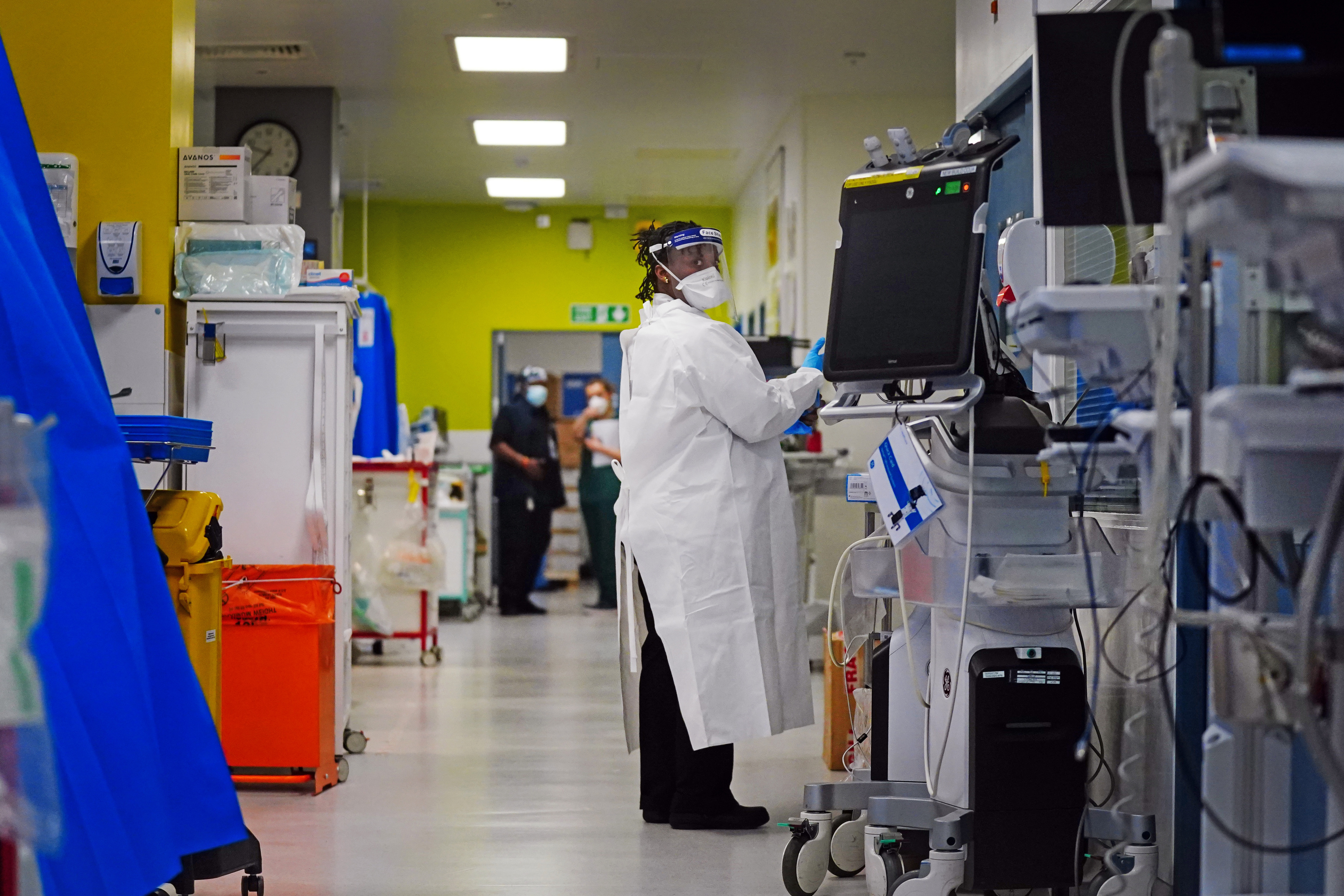 A medical staff member working in a critical care unit 