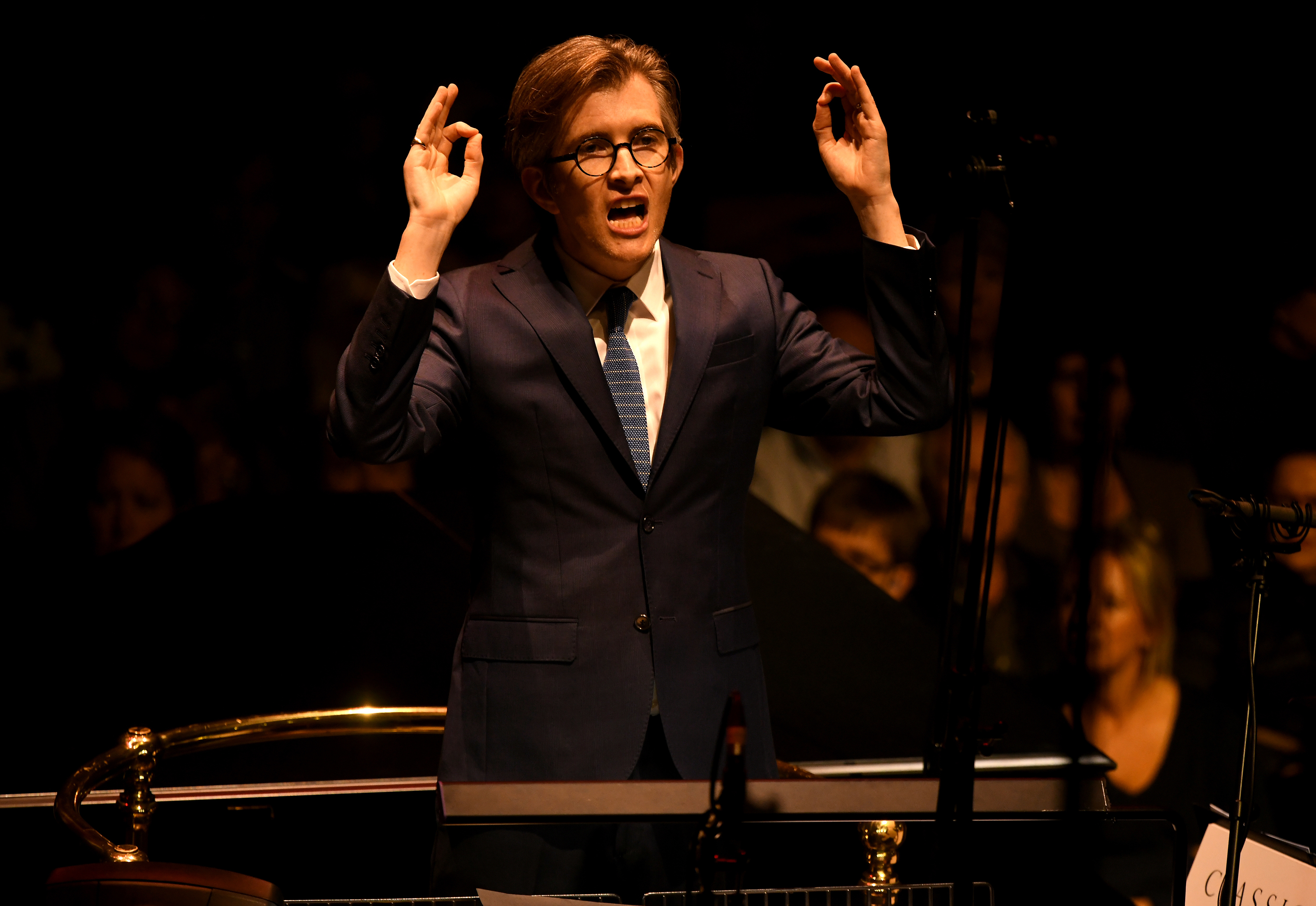 Gareth malone conducting the bournemouth symphony orchestra and chorus at classic fm live at london's royal albert hall