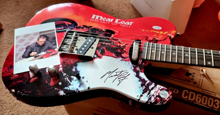 Signed guitar by Meat Loaf