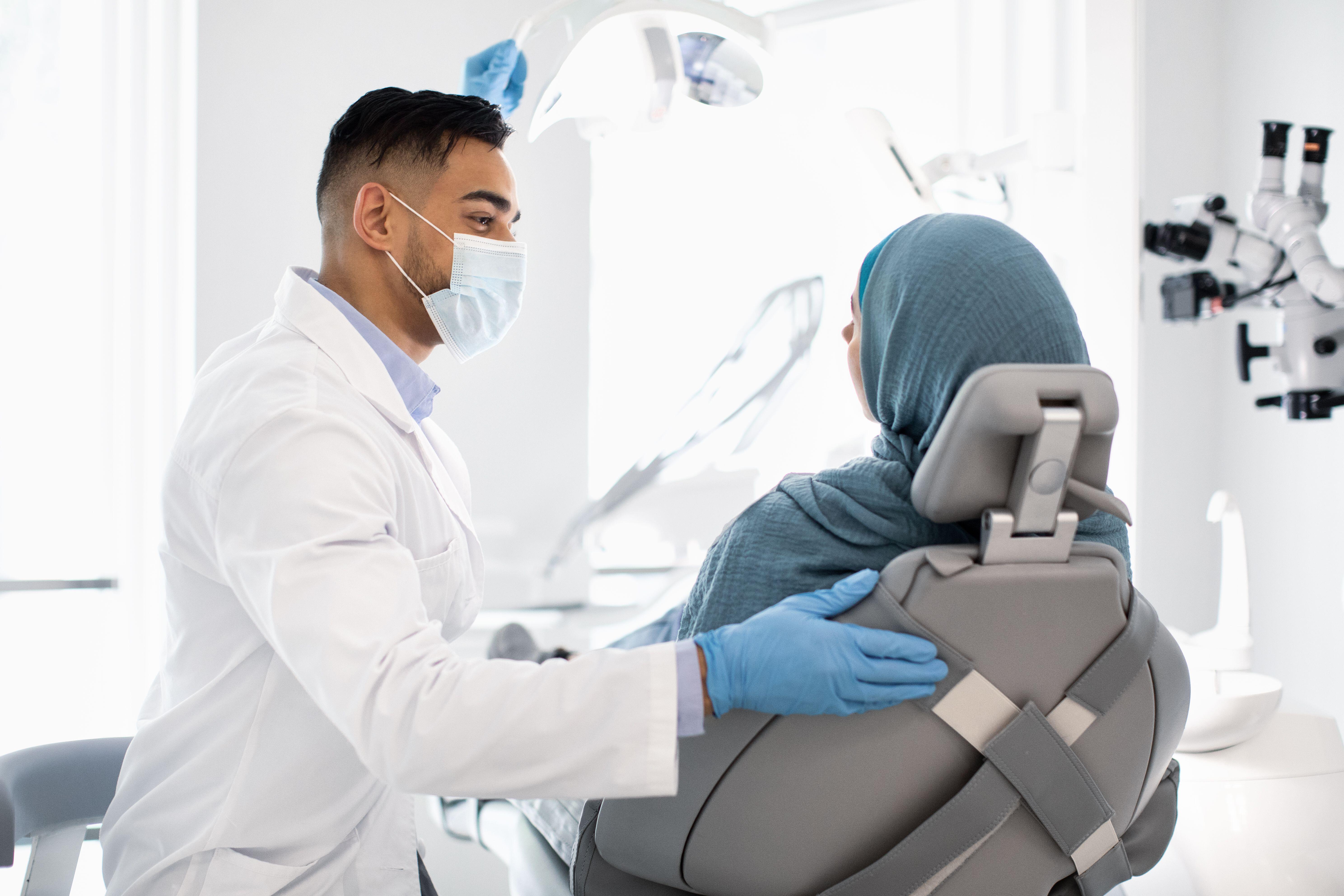 Muslim woman having a dental check-up