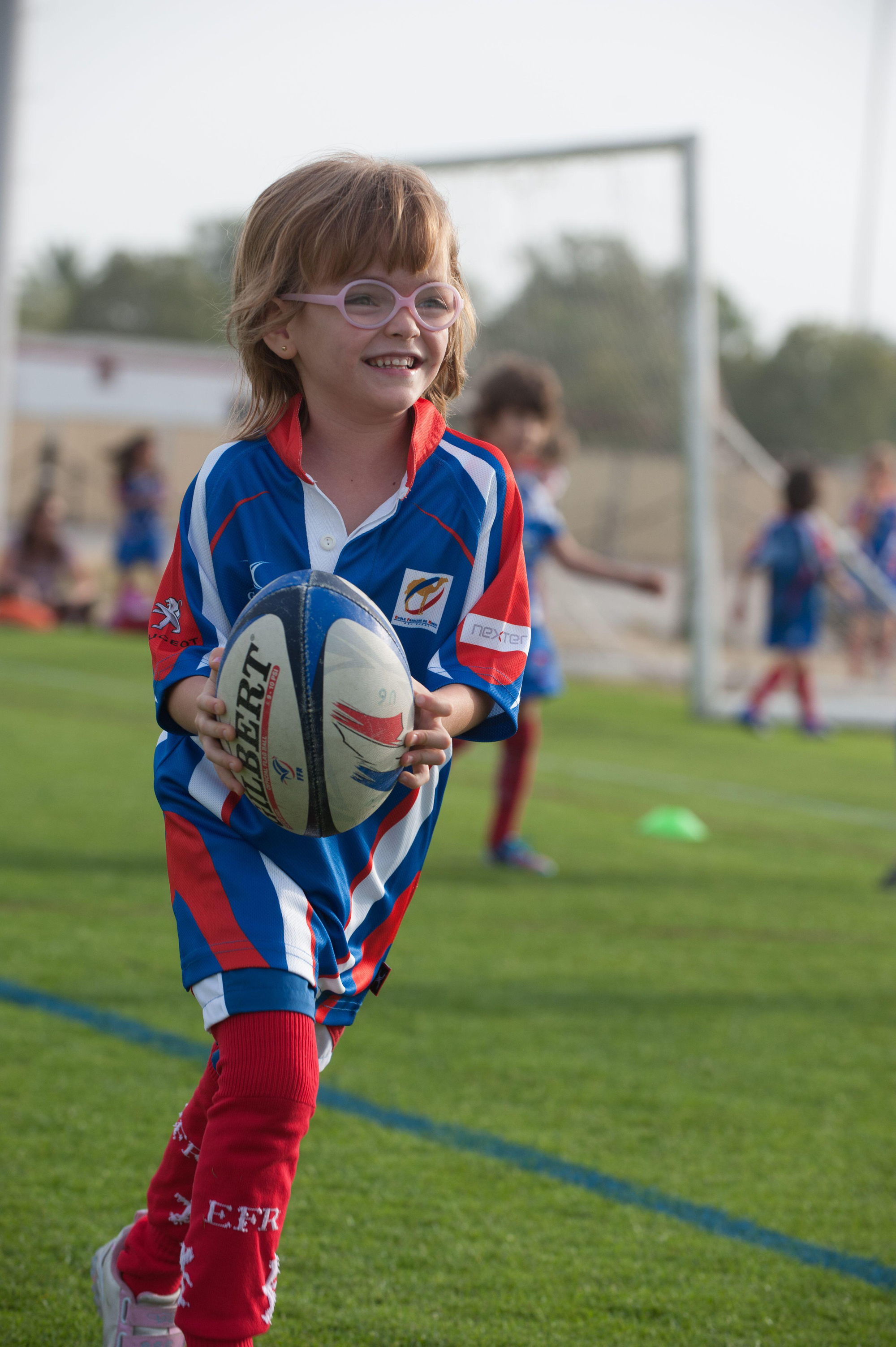 Child playing rugby