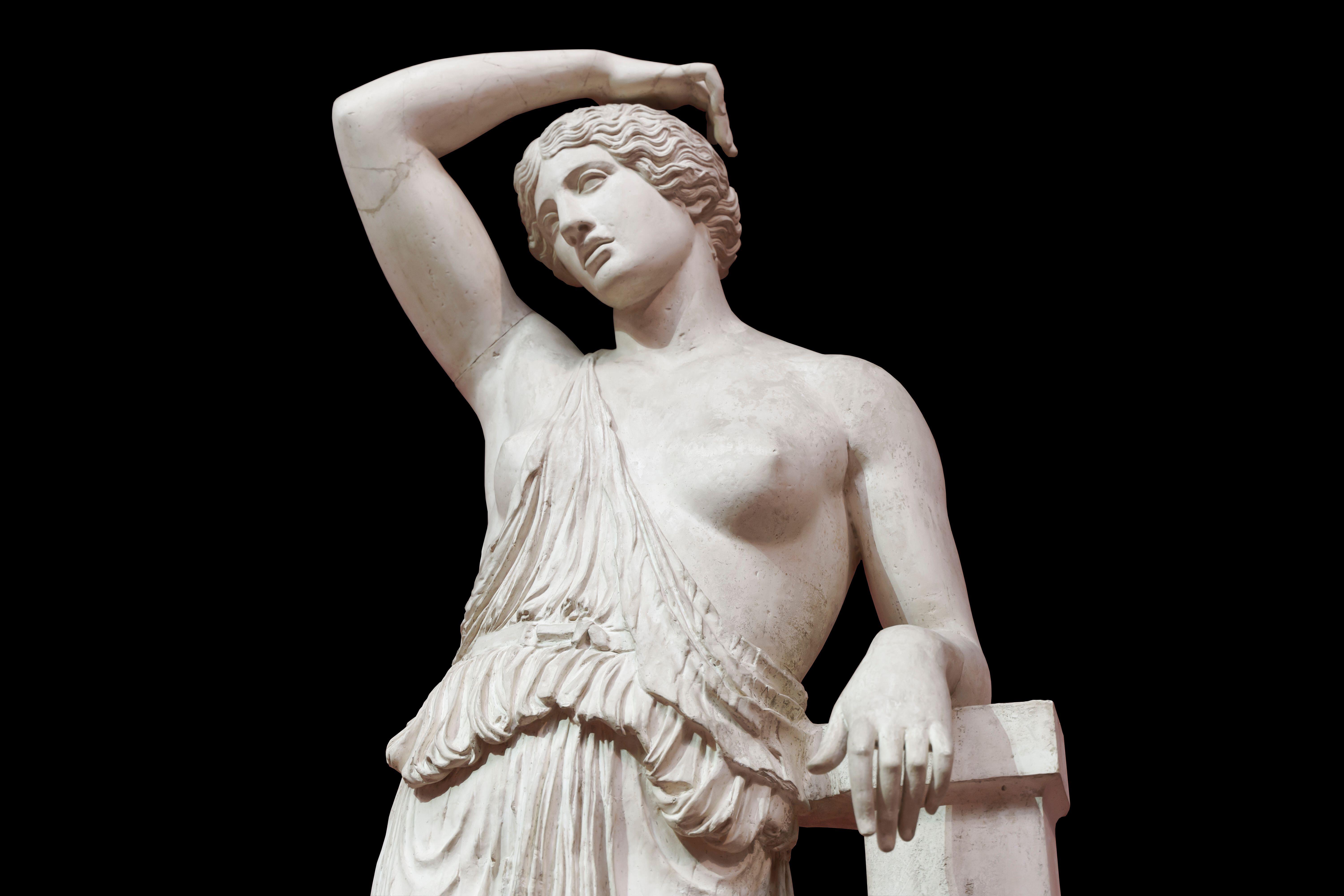 A classical antique sculpture of a woman