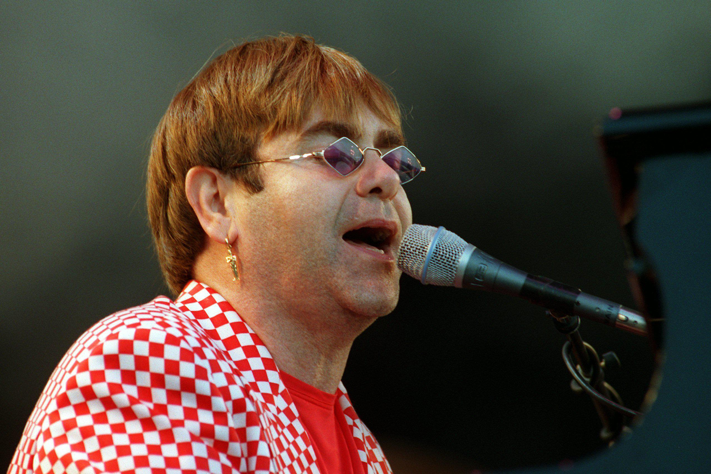 Elton John performing in 1995