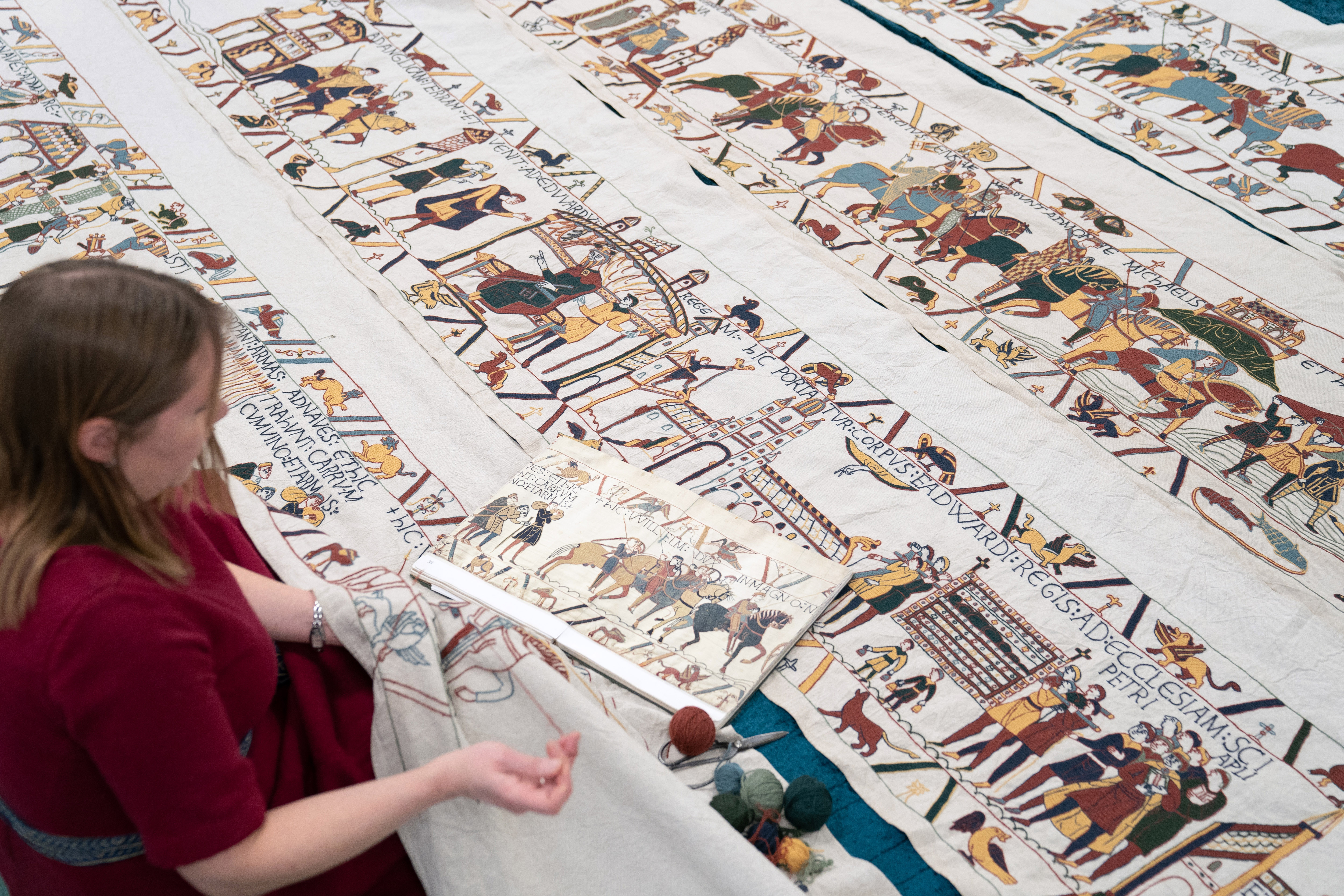 Miss Hansson said she has noticed mistakes in the original Bayeux Tapestry and copies them in her replica to 'honour what they've done'. (Joe Giddens/ PA)