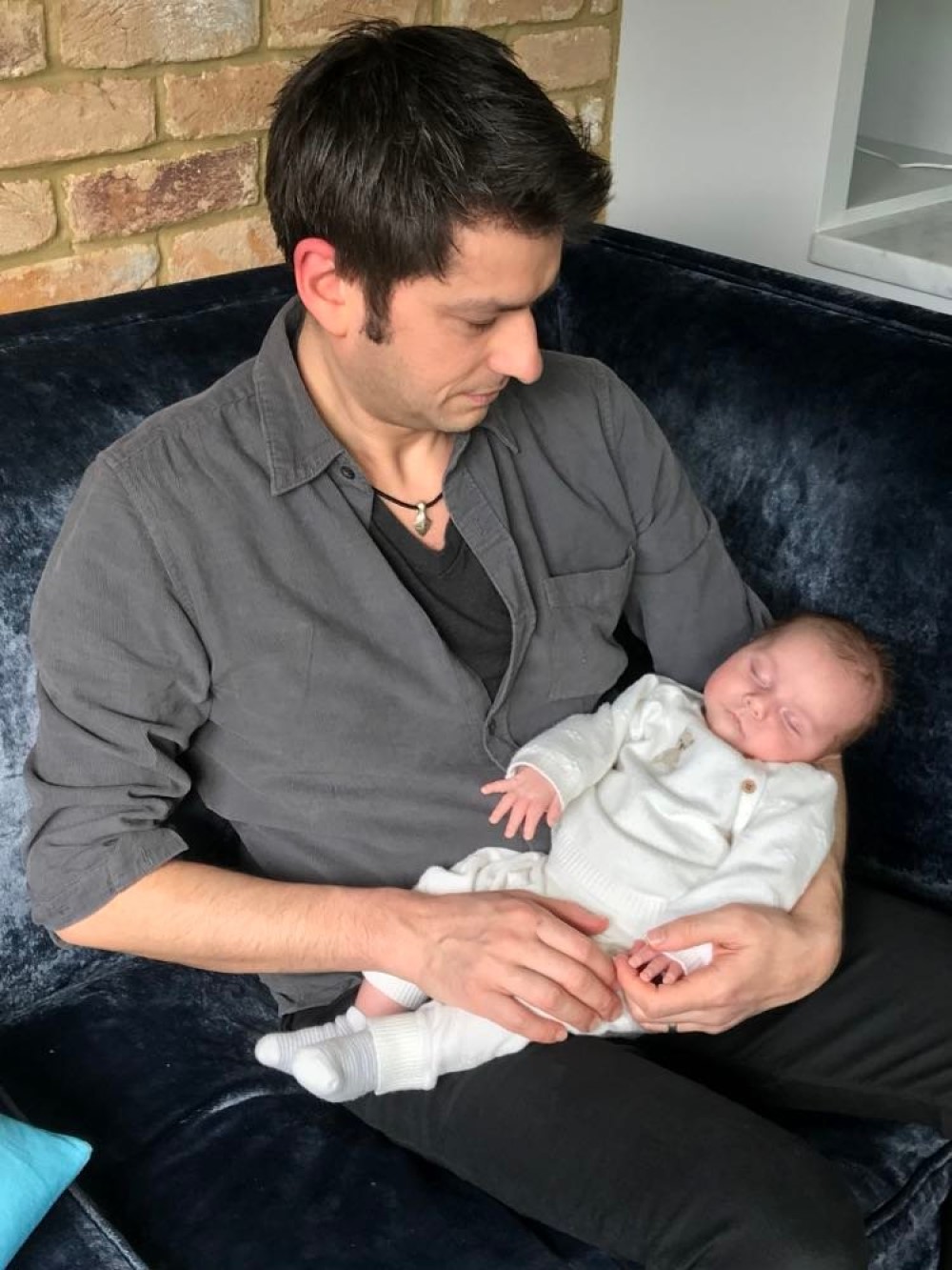 Ben Garratt and baby Raphael