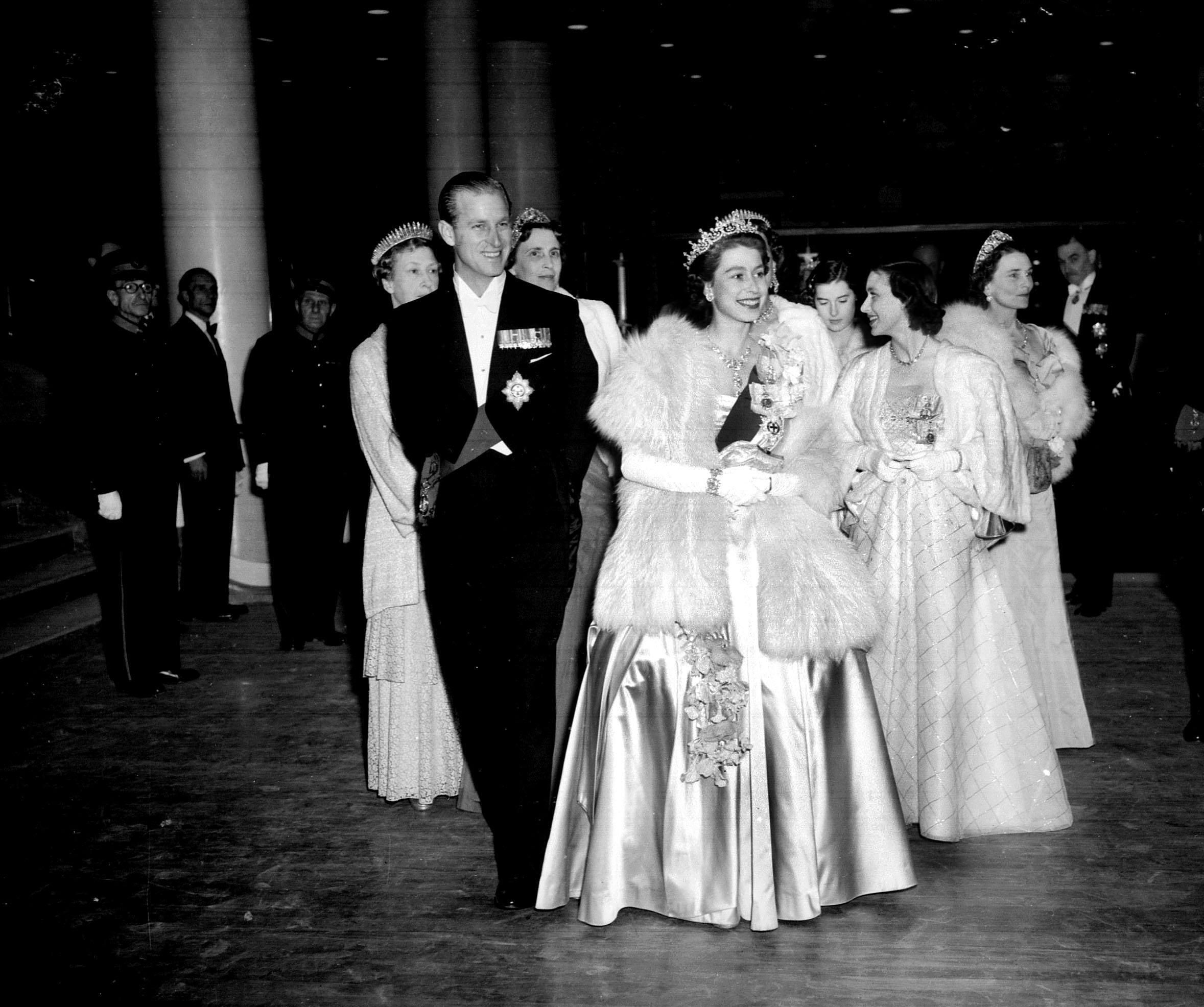 Princess Elizabeth and the Duke of Edinburgh lead the Royals as they attend the opening night of the Royal Festival Hall at the South Bank, London
