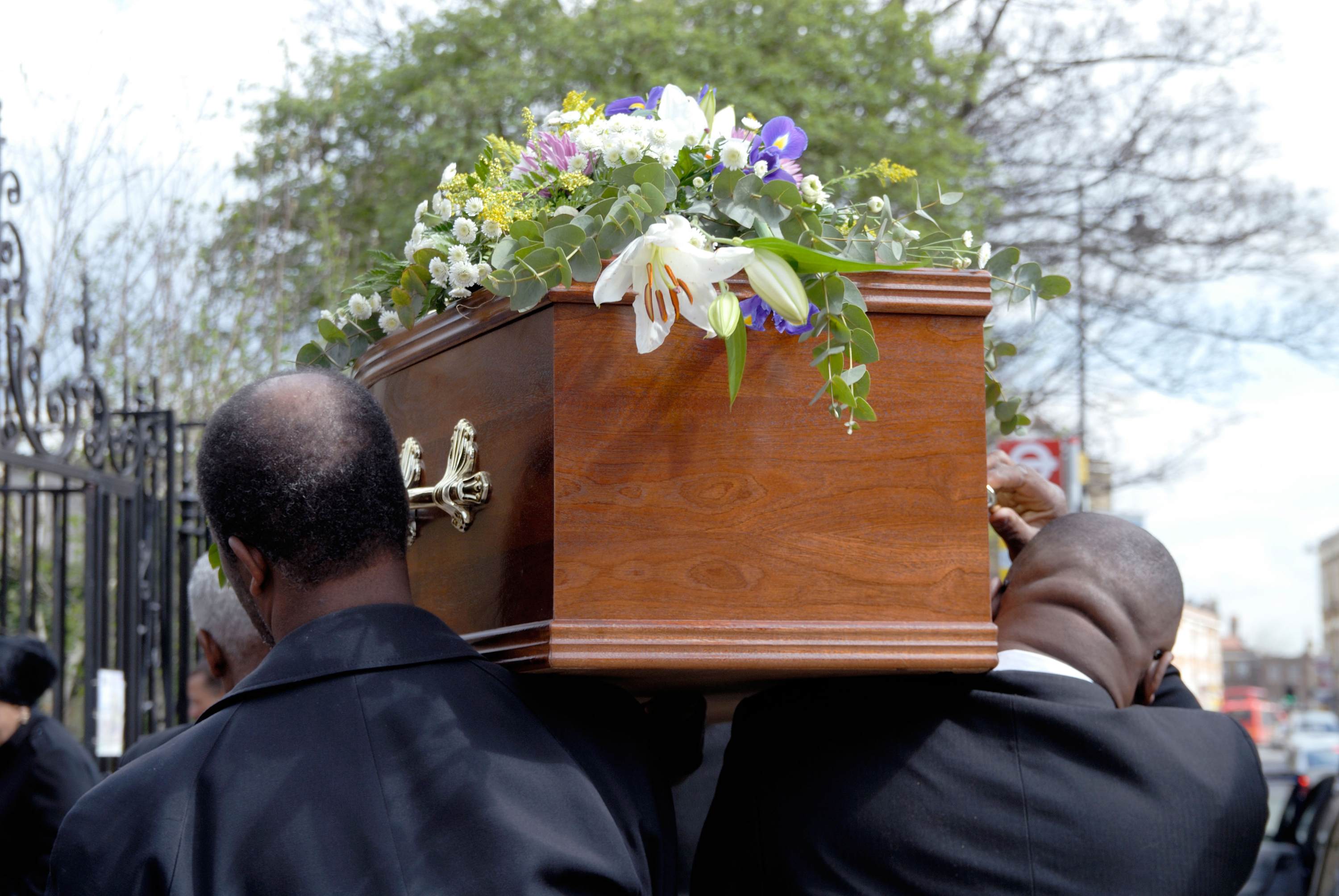 Pallbearers carrying a coffin