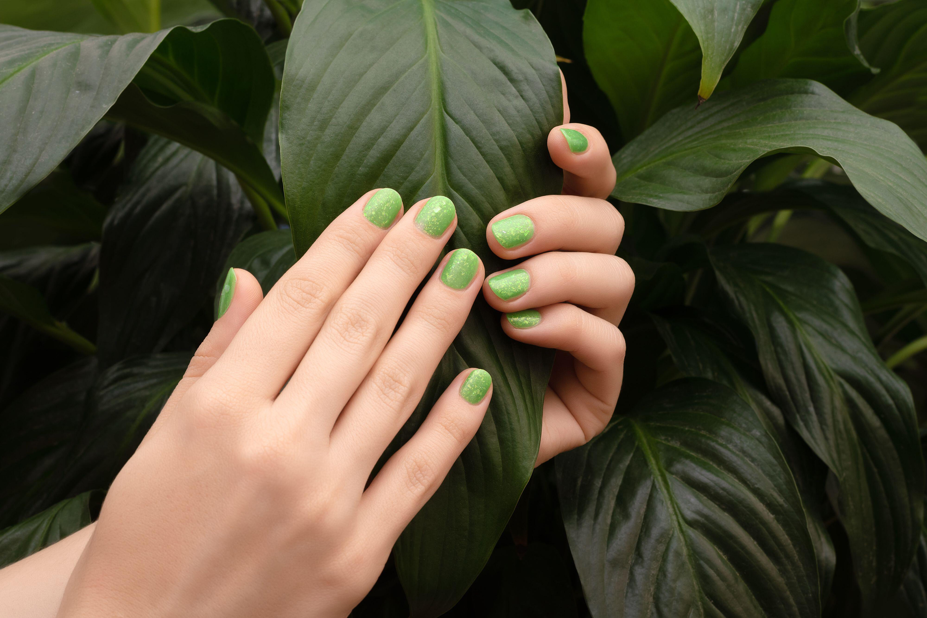 Nails with green polish