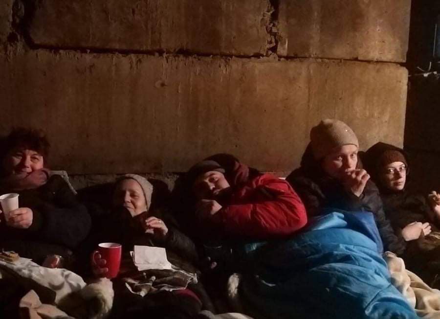 A family sheltering in their house in Ukraine as Russian bombs can be heard falling around them.