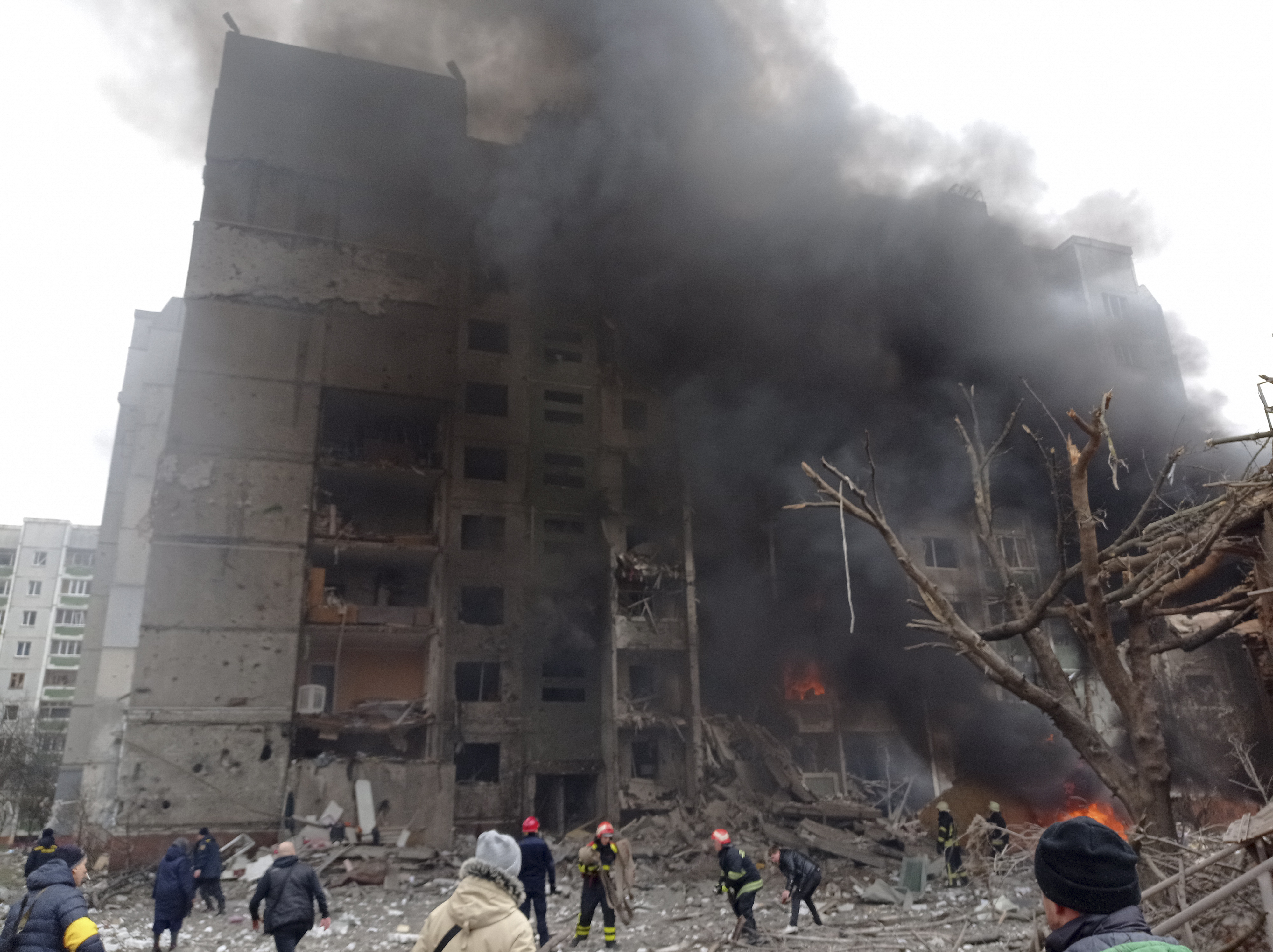 Firefighters work to extinguish a fire at a damaged city centre after a Russian air raid in Chernigiv, Ukraine, 