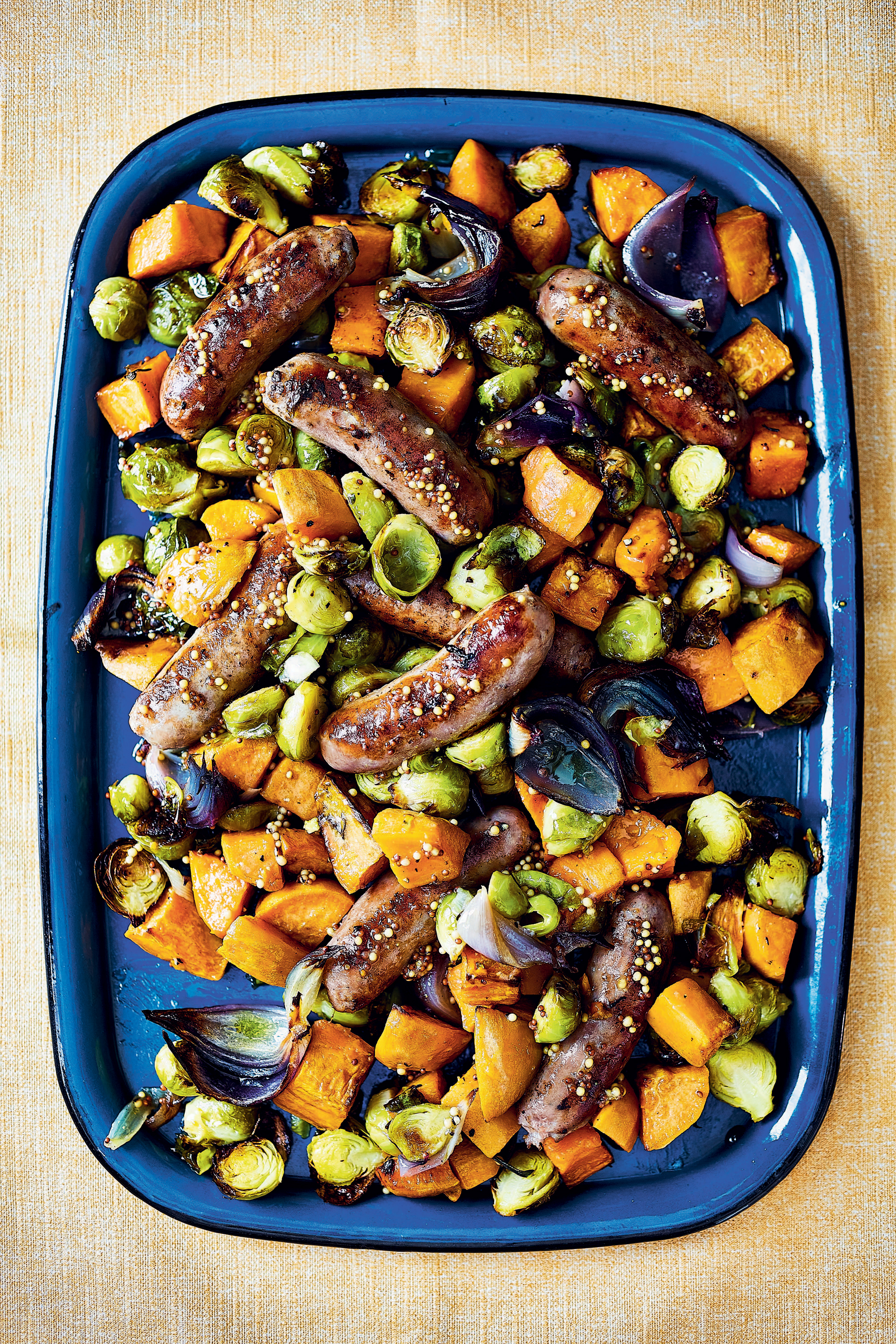 Sausage, sweet potato and mustard traybake