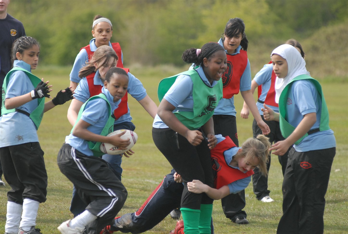 Girls playing rugby (Women in Sport/PA)