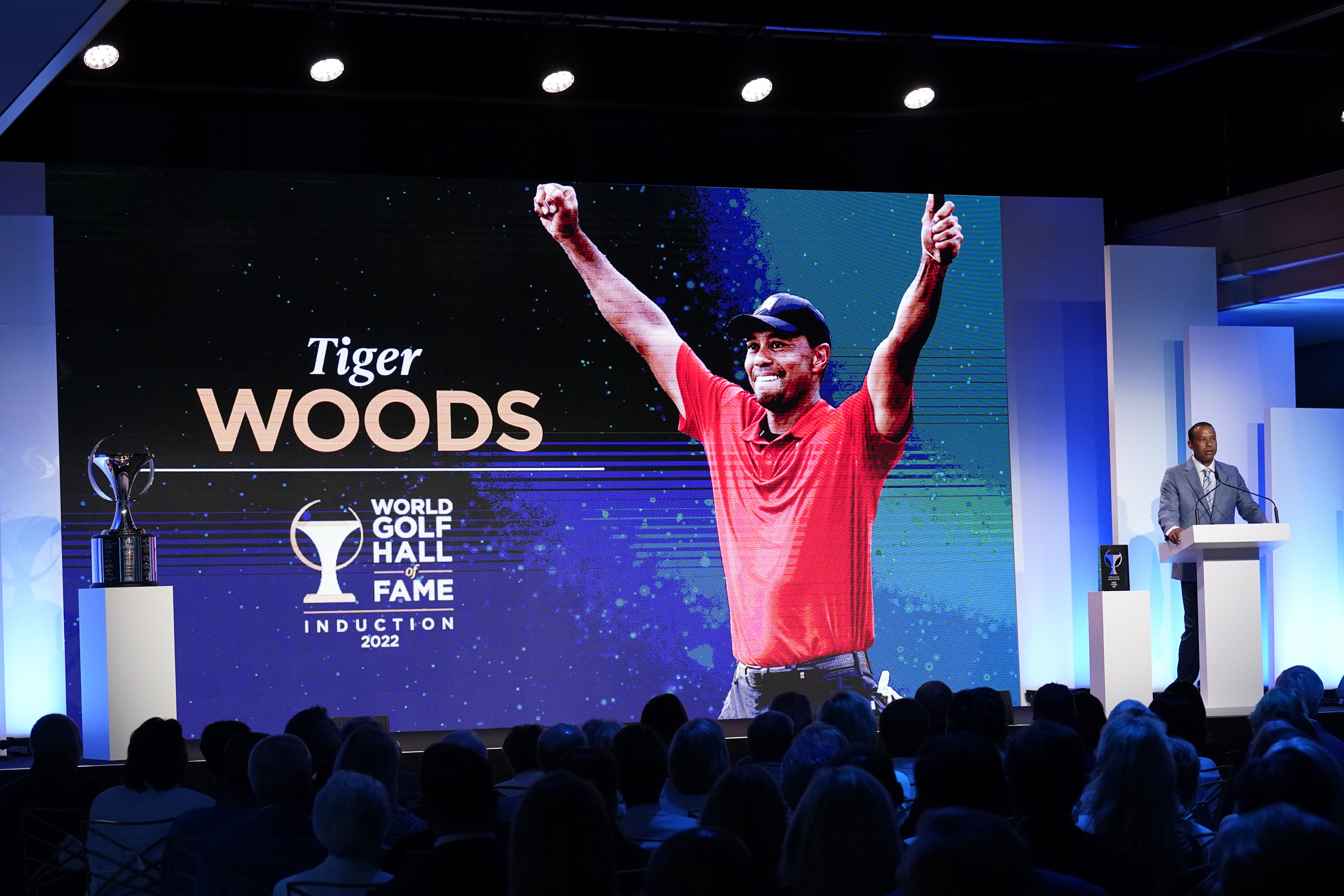 Tiger Woods speaks during his induction into the World Golf Hall of Fame on Wednesday night (Gerald Herbert/AP)