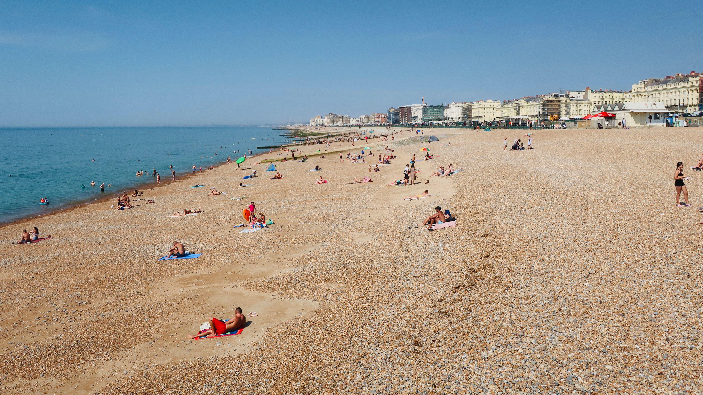 People enjoying themselves on Brighton beach