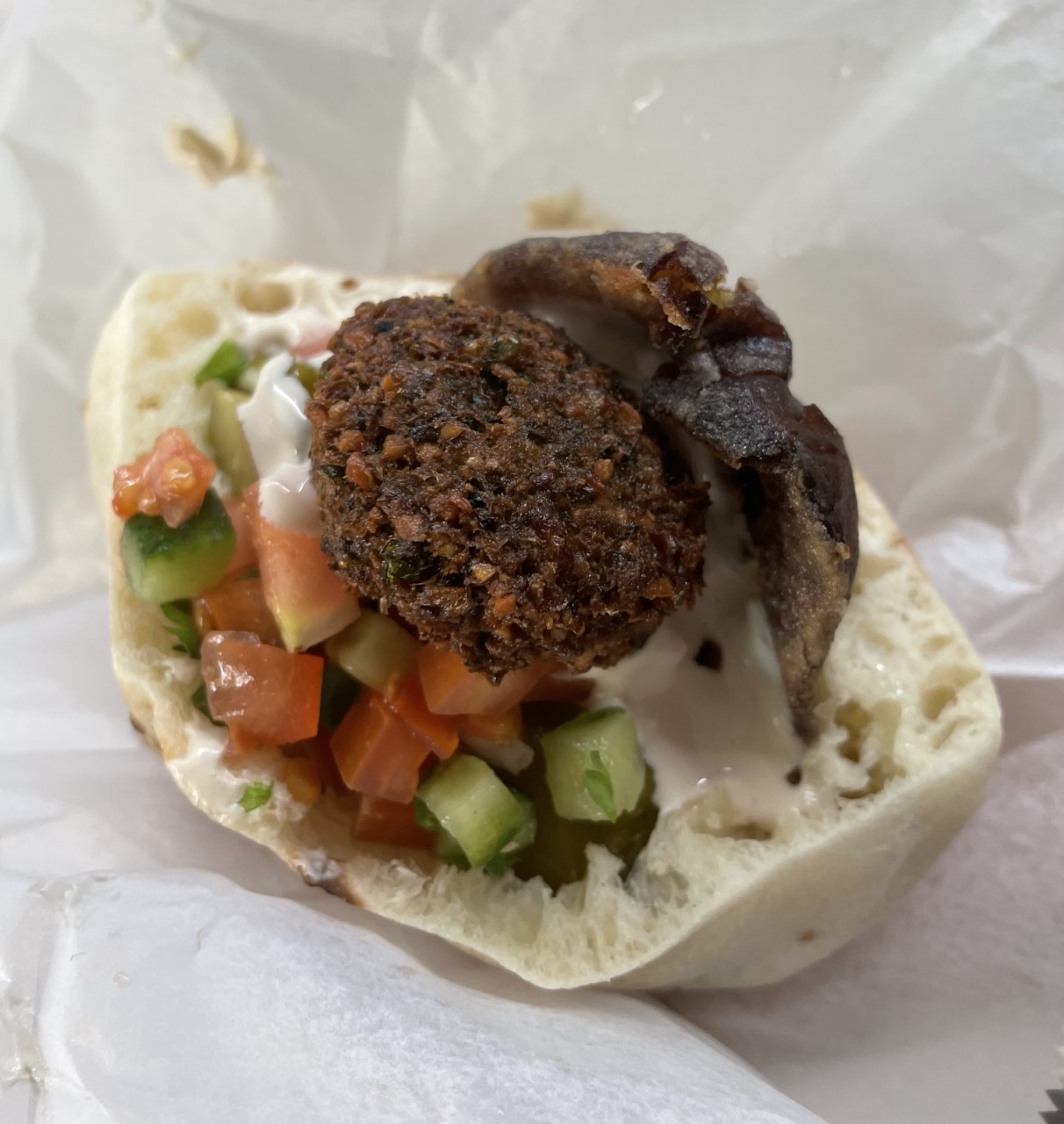 Hakosem fafafel in Tel Aviv, served in the fluffiest of pittas (Jemma Crew/PA)