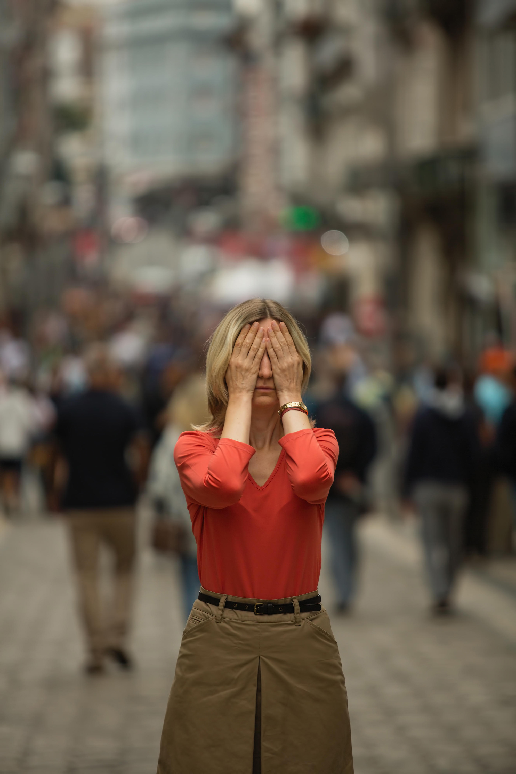 Woman having a panic attack in public