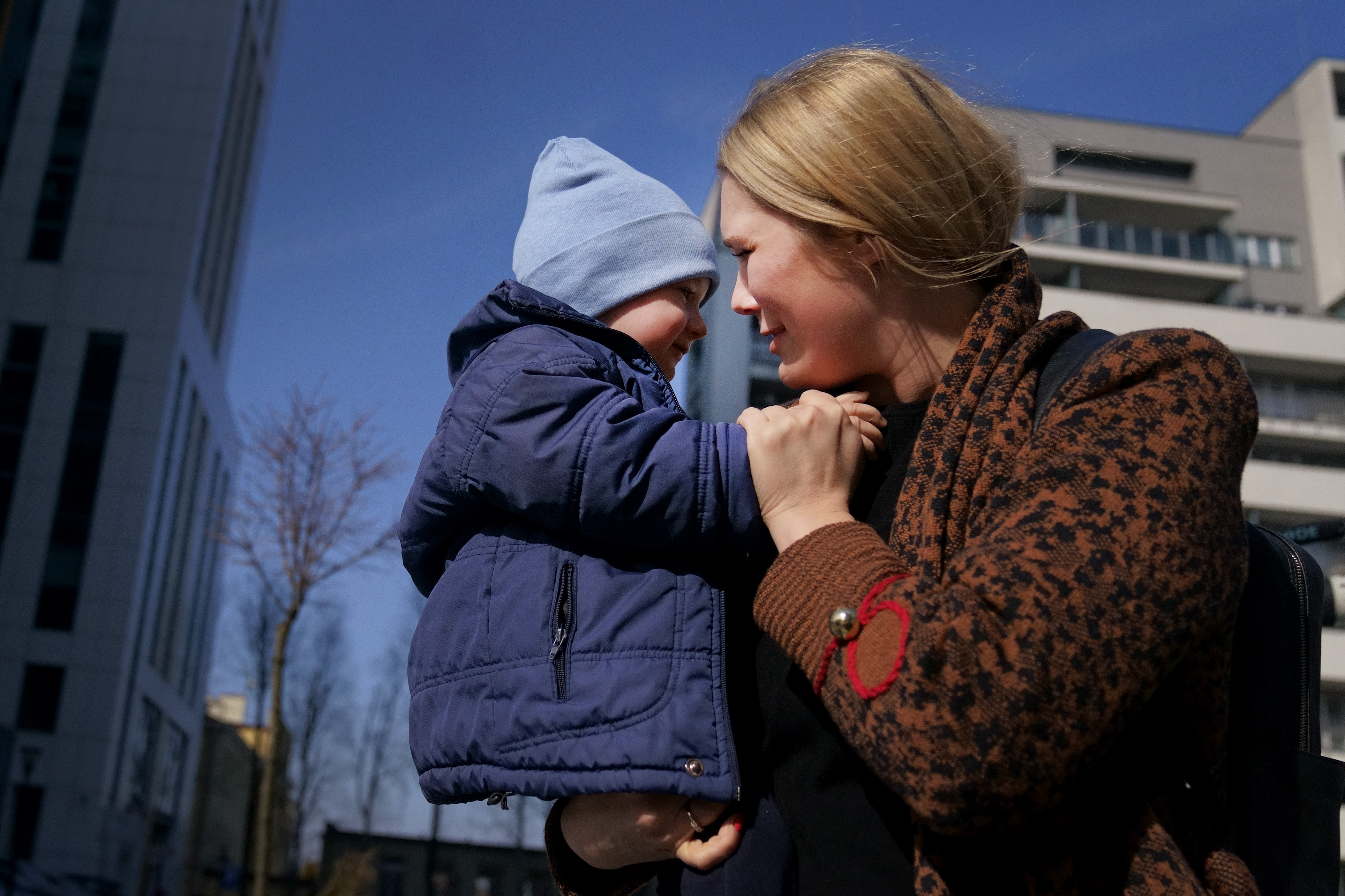 Reunited with her son in Rzeszow, Poland, after her extended family fled the war in Ukraine 