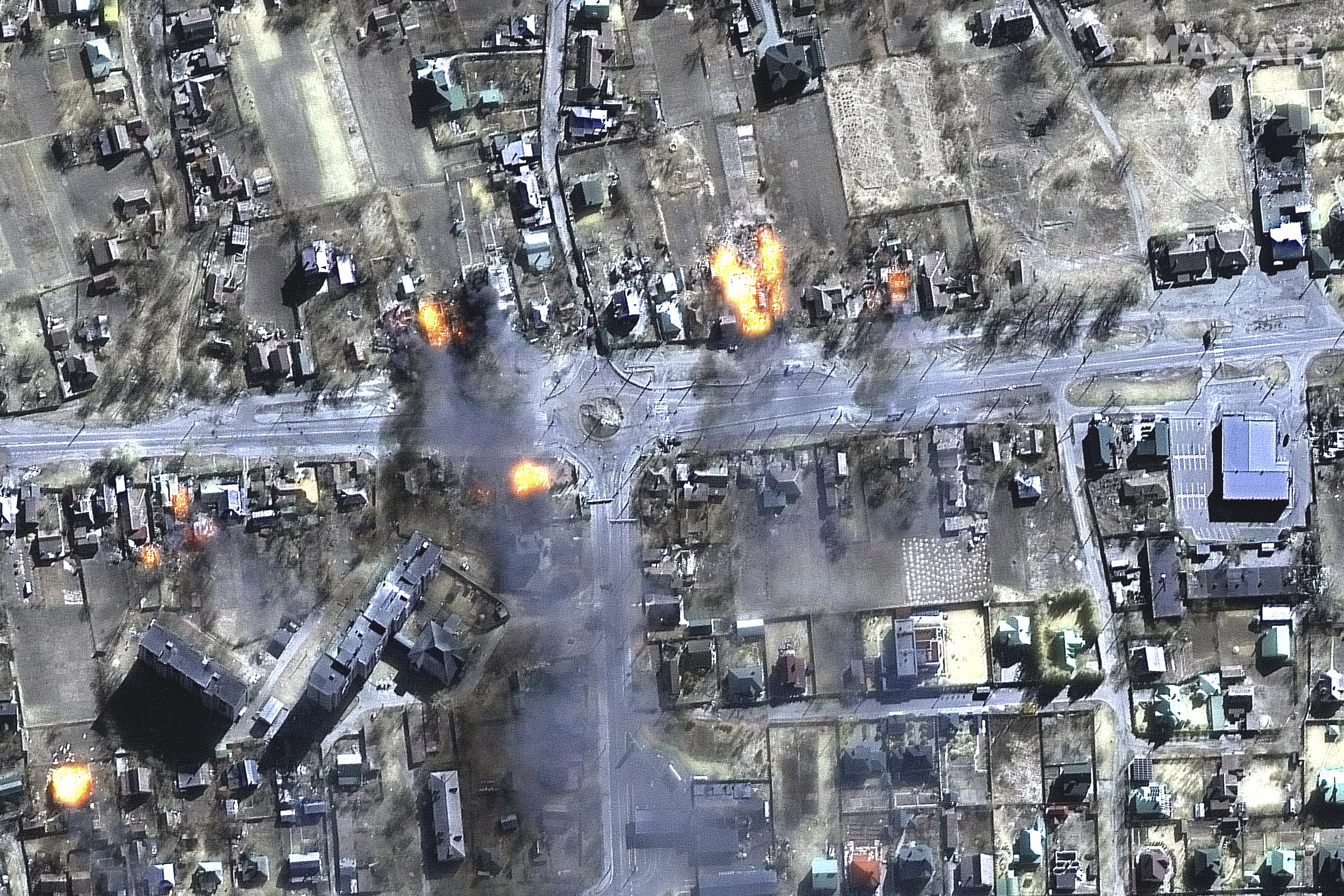 This satellite image provided by Maxar Technologies shows burning buildings in a residential area in north-east Chernihiv, Ukraine